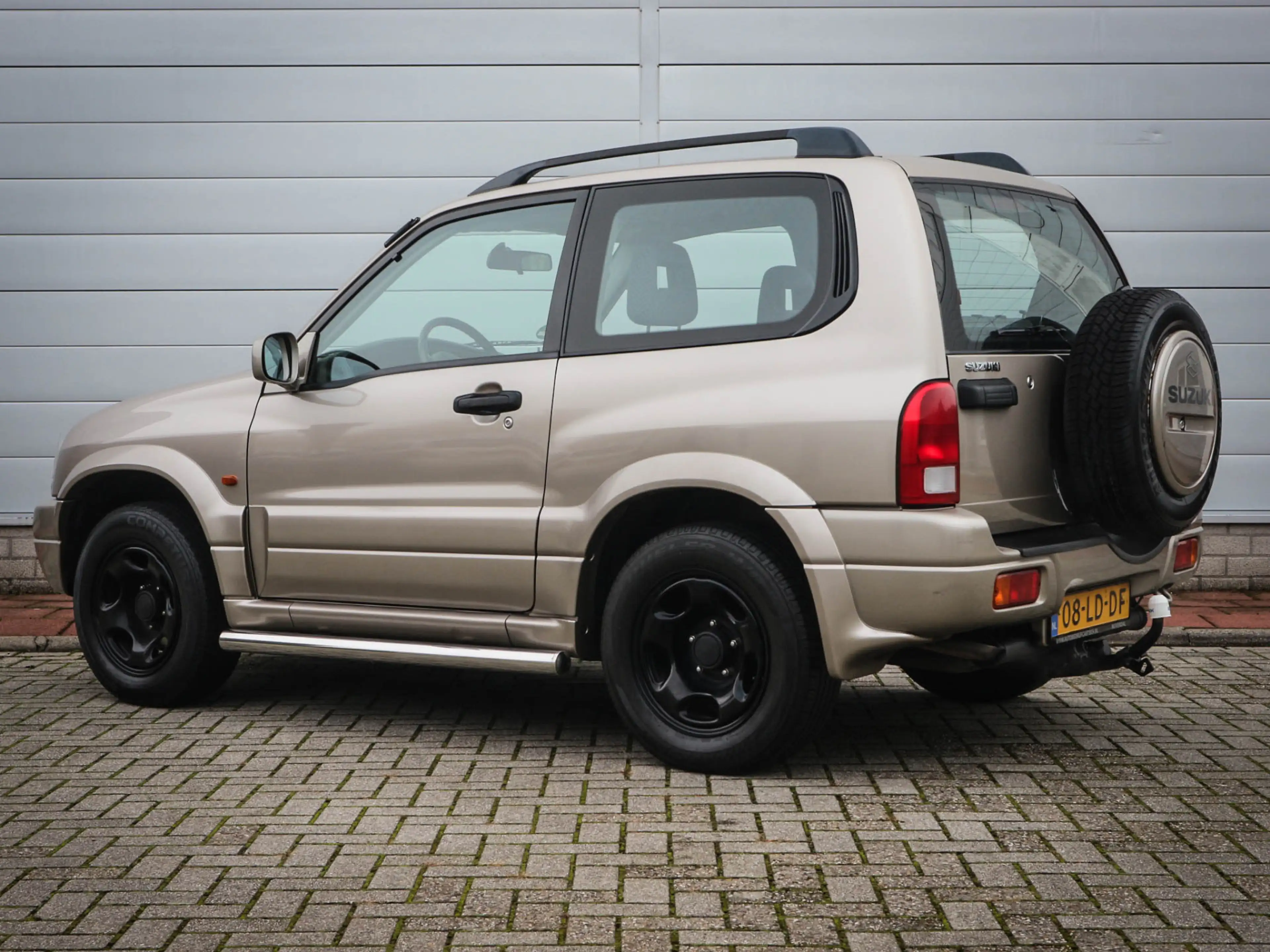 Suzuki Grand Vitara 1.6 Metal Top Wide Body | Audio | Elektrische rame — photo 10