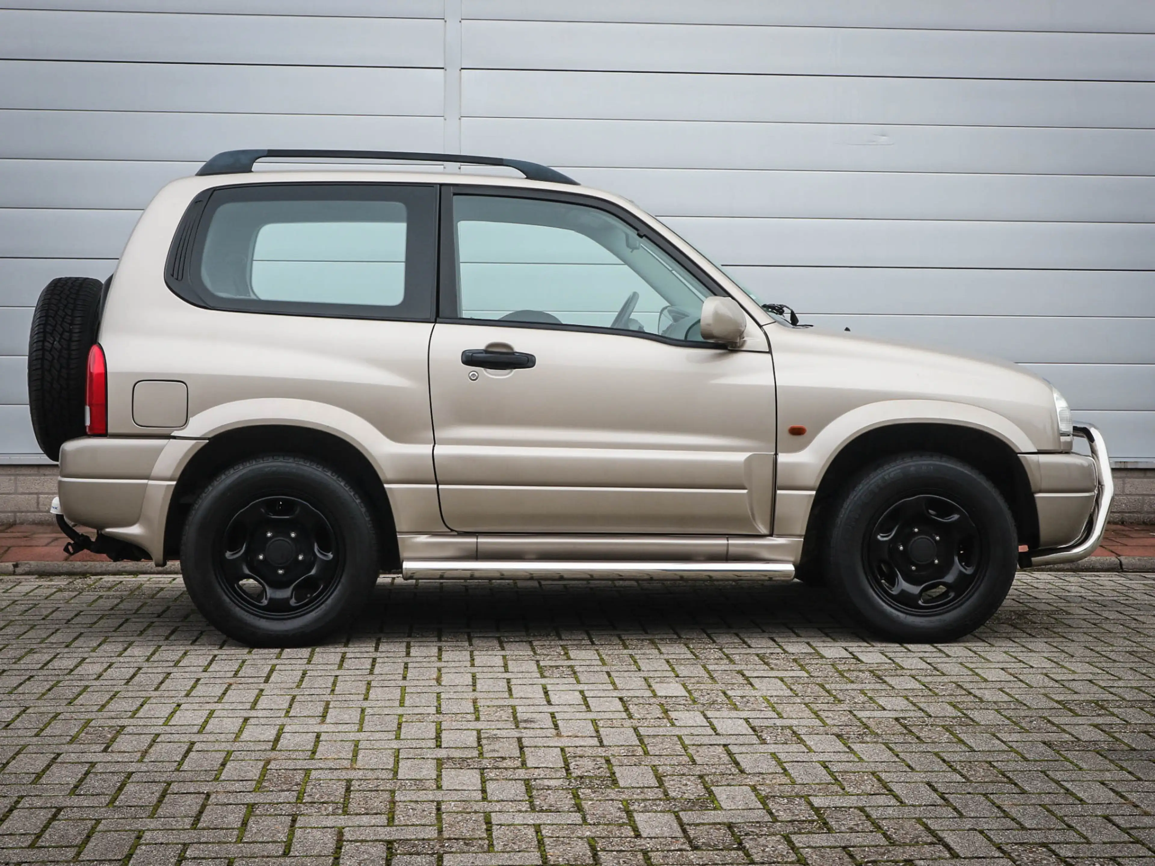 Suzuki Grand Vitara 1.6 Metal Top Wide Body | Audio | Elektrische rame — photo 12