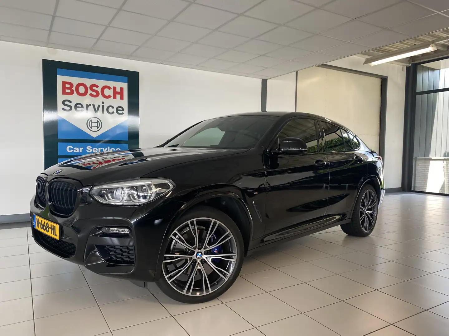 BMW X4 xDrive20i High Executive Edition M Sport / Leer / Zwart - 1