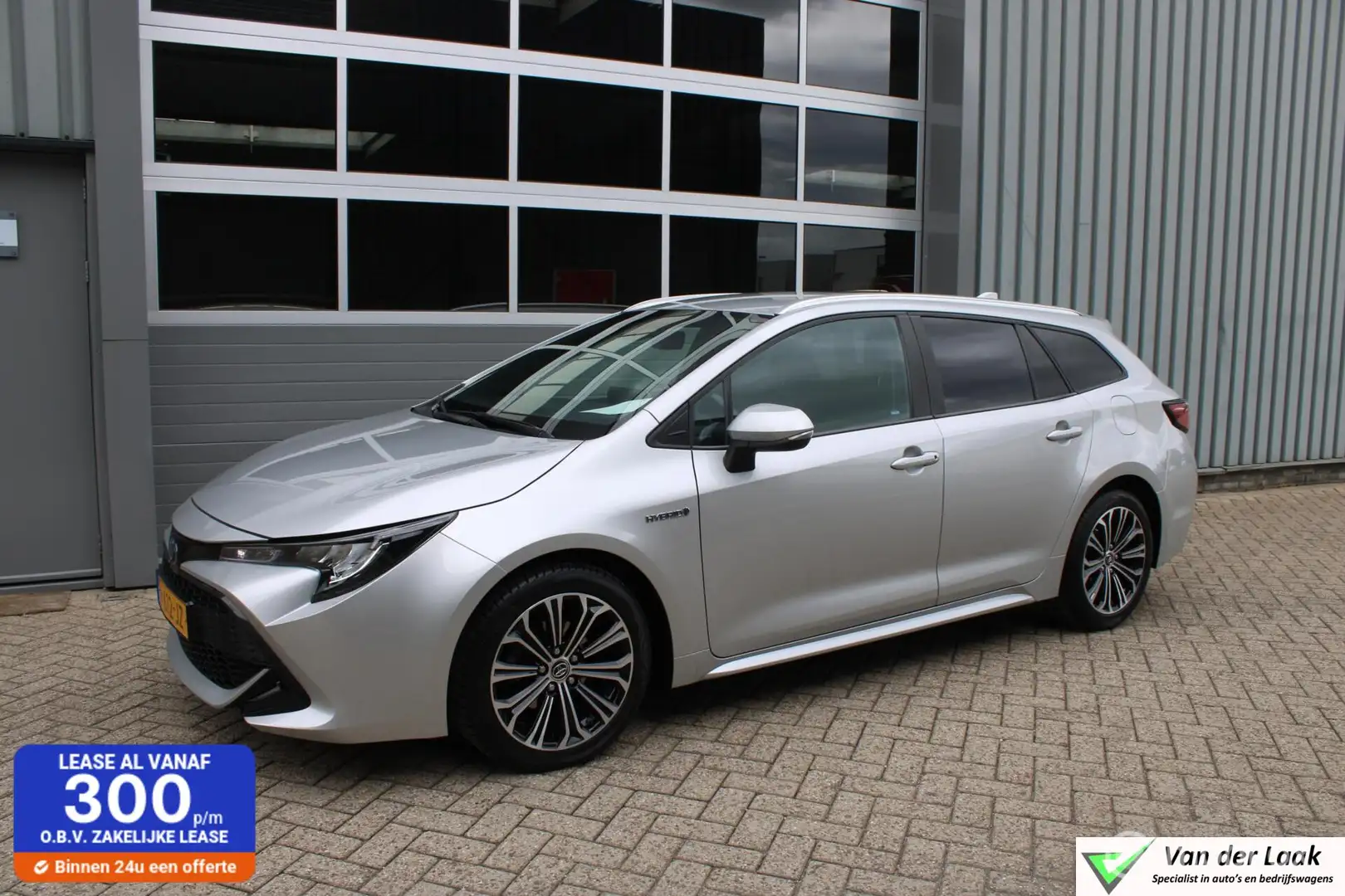 Toyota Corolla Touring Sports 1.8 Hybrid Business Plus 20 TOYOTA Grijs - 1