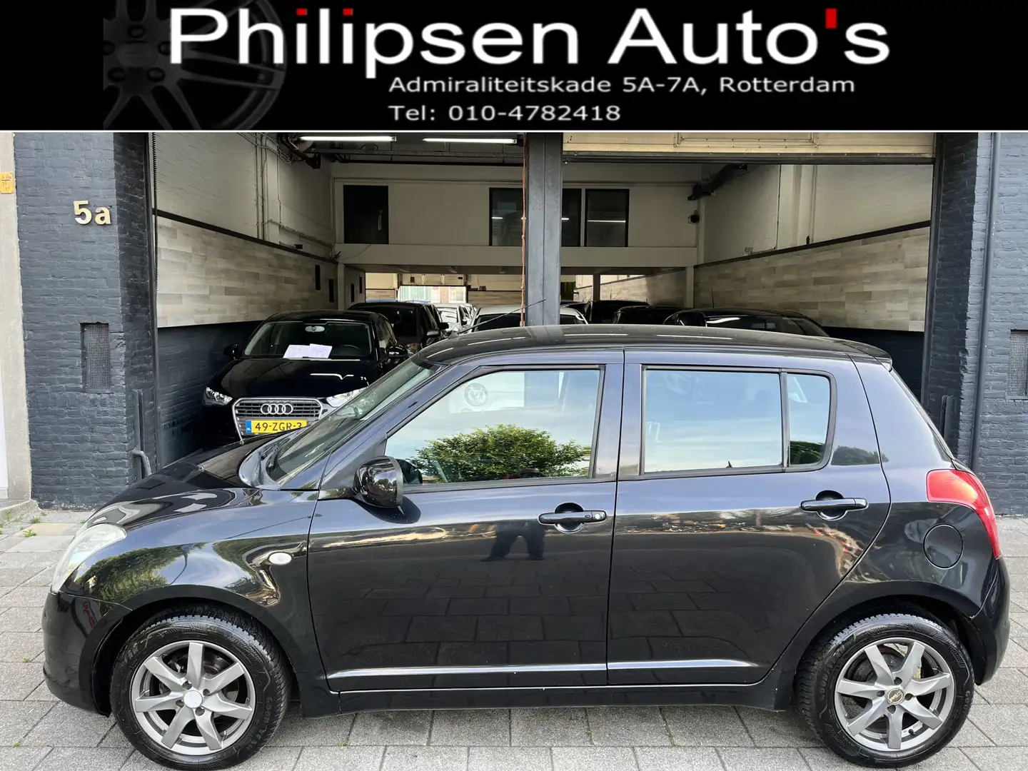 Suzuki Swift 1.3 Comfort Automaat Zwart - 1