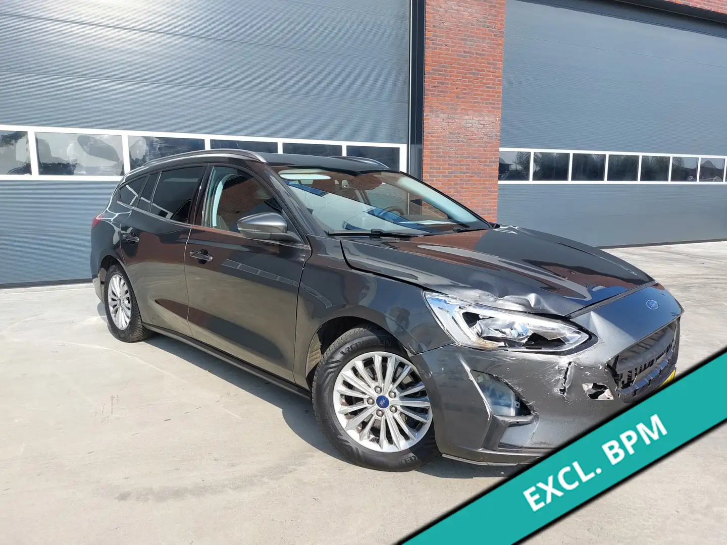 Ford Focus Wagon 1.5 EcoBlue Titanium Business Lichte schade Grijs - 1