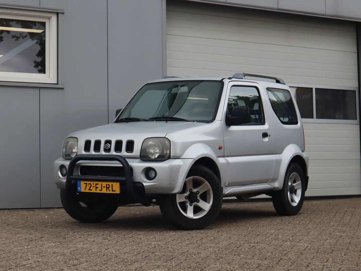 Suzuki Jimny 1.3 JLX 4X4 / Airco Gris - 1