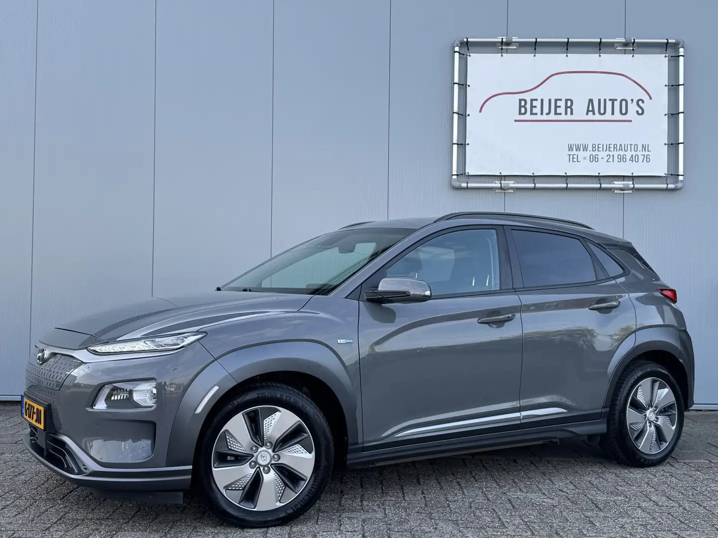 Hyundai KONA EV Premium 64 kWh Camera/Leer/Climate. Gris - 1