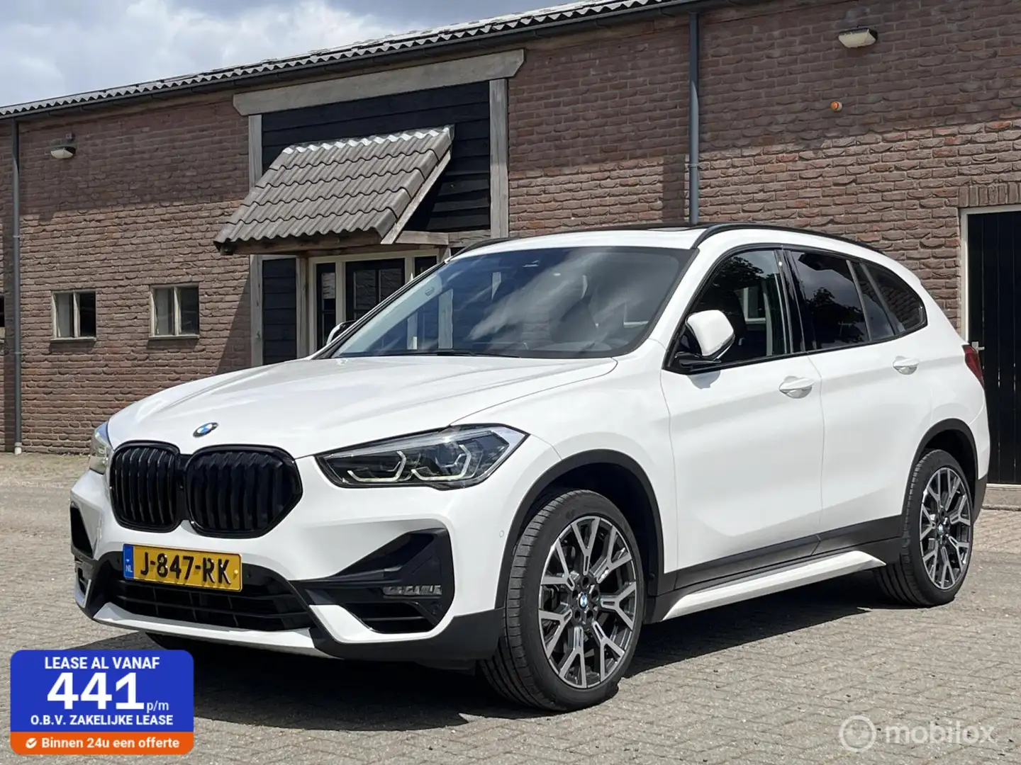 BMW X1 sDrive20i High Executive Edition Head-Up Dak Camer Wit - 1