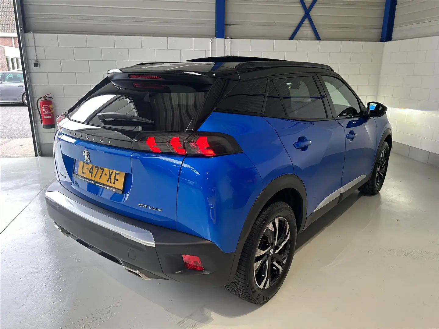 Peugeot 2008 1.2 Puretech 130pk EAT8 GT-Line, Pano, VOL! Blauw - 2