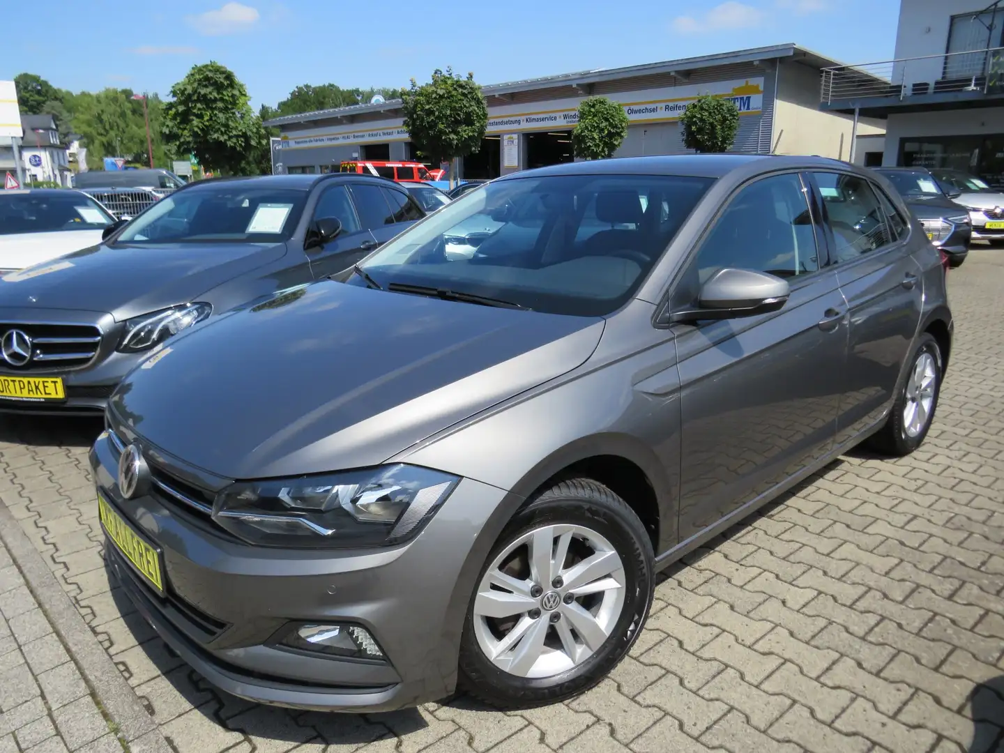 Volkswagen Polo 1.0TSI Comfortline *1.HAND*KLIMA*SITZHZG*GARANTIE Gris - 1