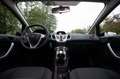Ford Fiesta 1.25 Ghia Airco PDC NL-auto 65.700 km + NAP Zwart - thumbnail 16