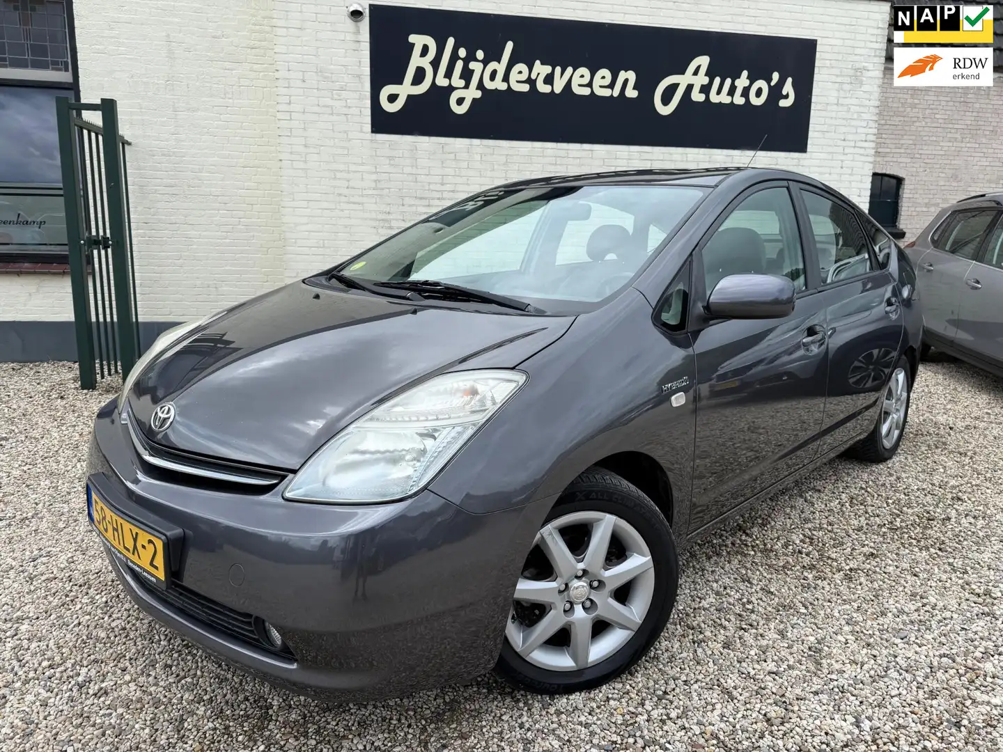 Toyota Prius 1.5 VVT-i Tech Edition 1e Eigenaar | Dealer Onderh Gris - 1