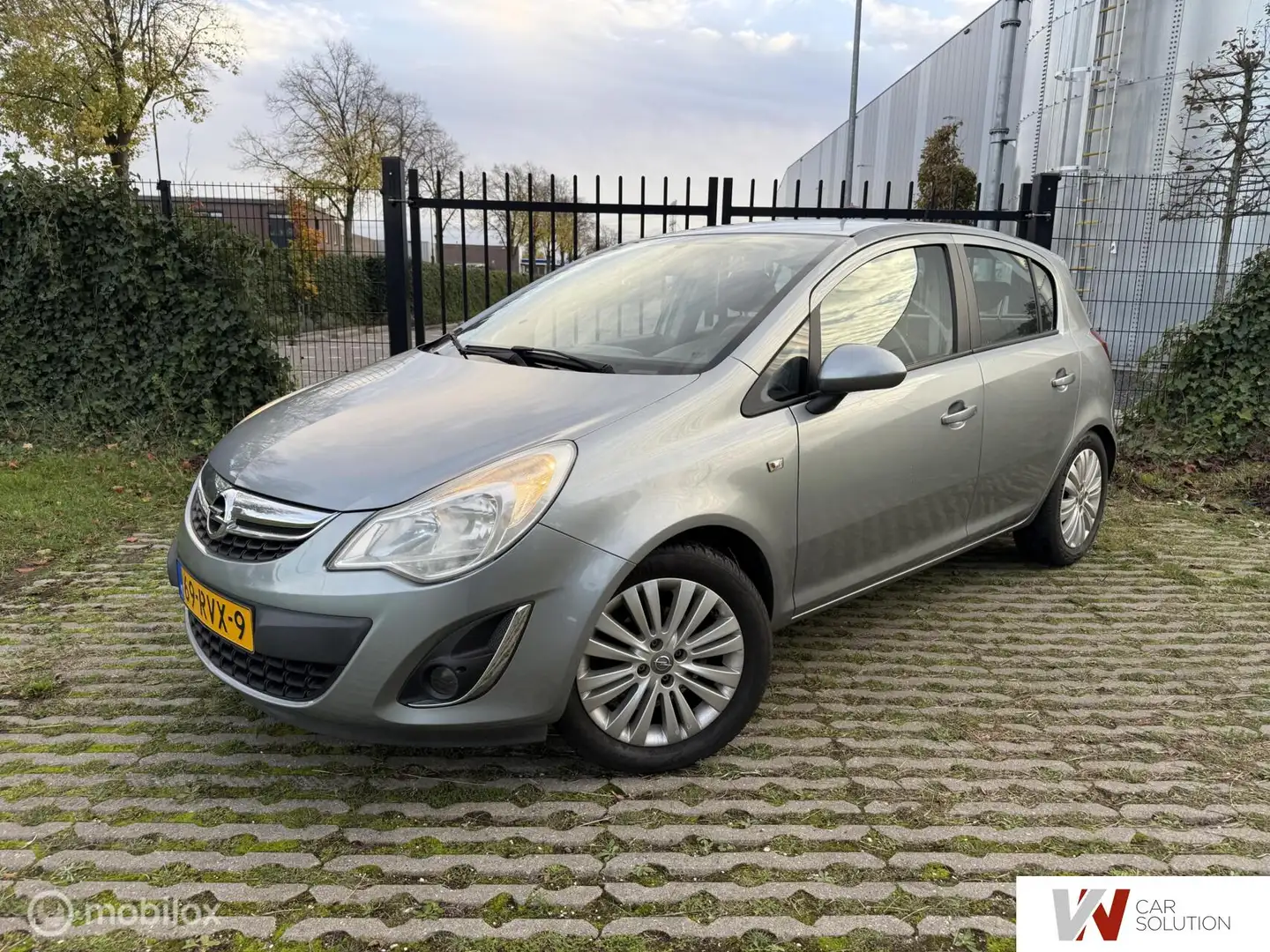 Opel Corsa 1.4-16V 1STE EIG NAP NAVI CRUISE TREKHAAK AIRCO Grijs - 1