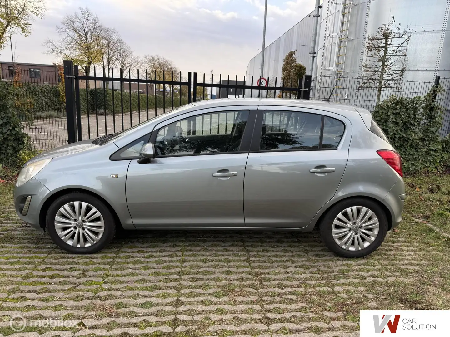 Opel Corsa 1.4-16V 1STE EIG NAP NAVI CRUISE TREKHAAK AIRCO Grijs - 2