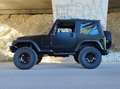 Jeep Wrangler 4.0L Sahara A Negro - thumbnail 50