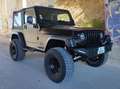 Jeep Wrangler 4.0L Sahara A Zwart - thumbnail 18
