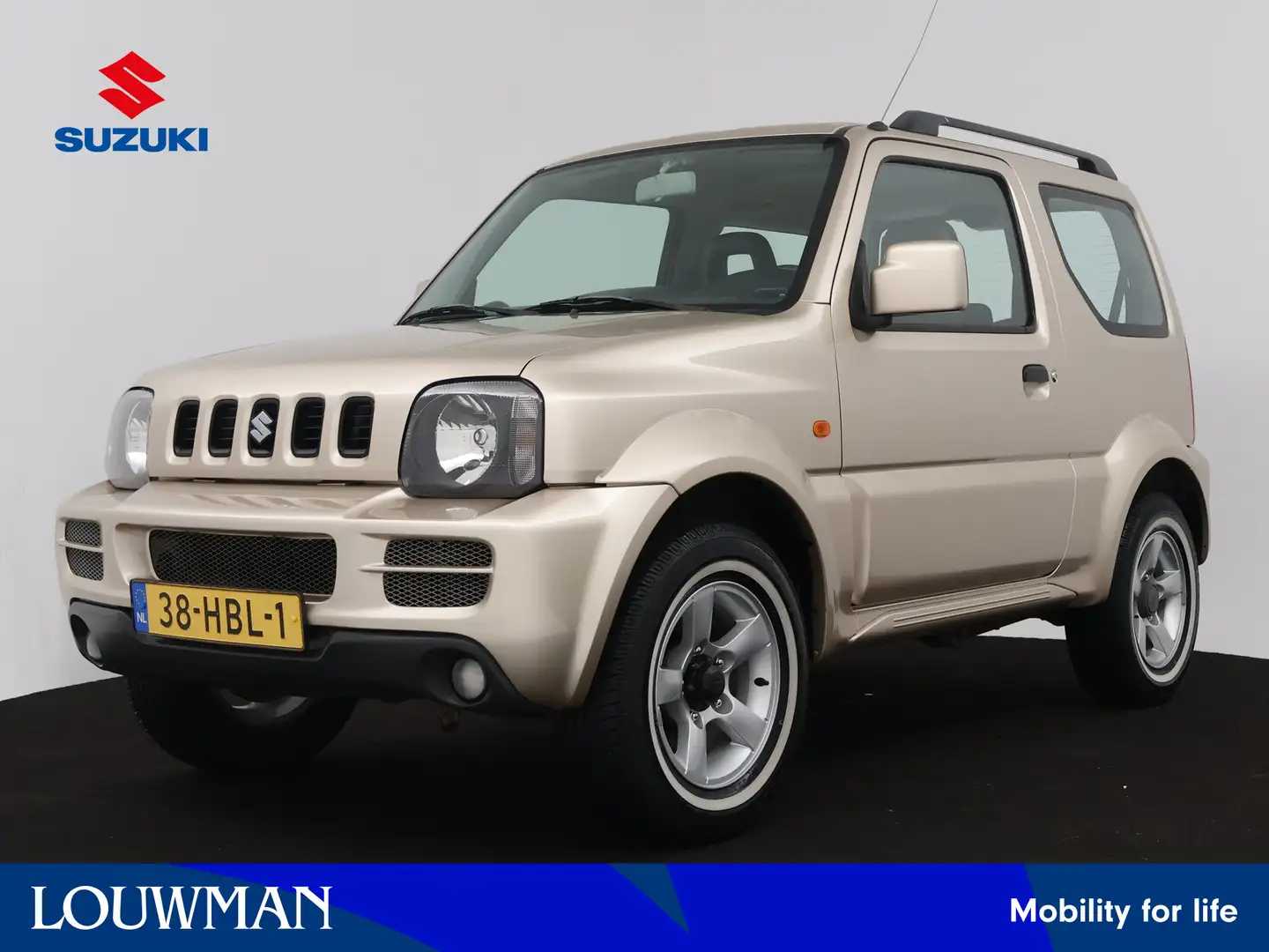 Suzuki Jimny 1.3 Exclusive | Airco | Elektrische ramen | Parkee Bej - 1