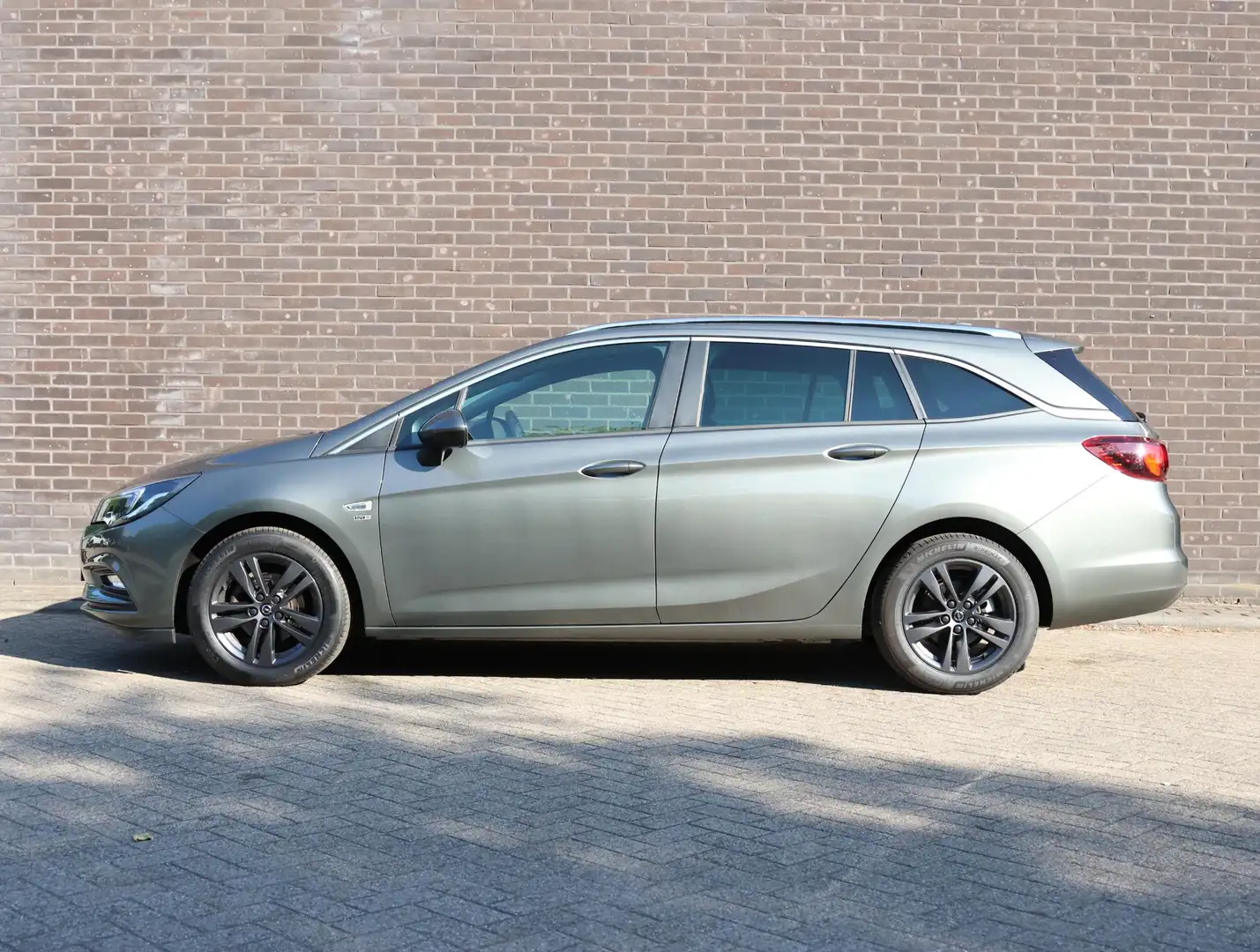 Opel Astra ST 120 Jaar Edition 105pk | Navigatie | Climate Co Grau - 2