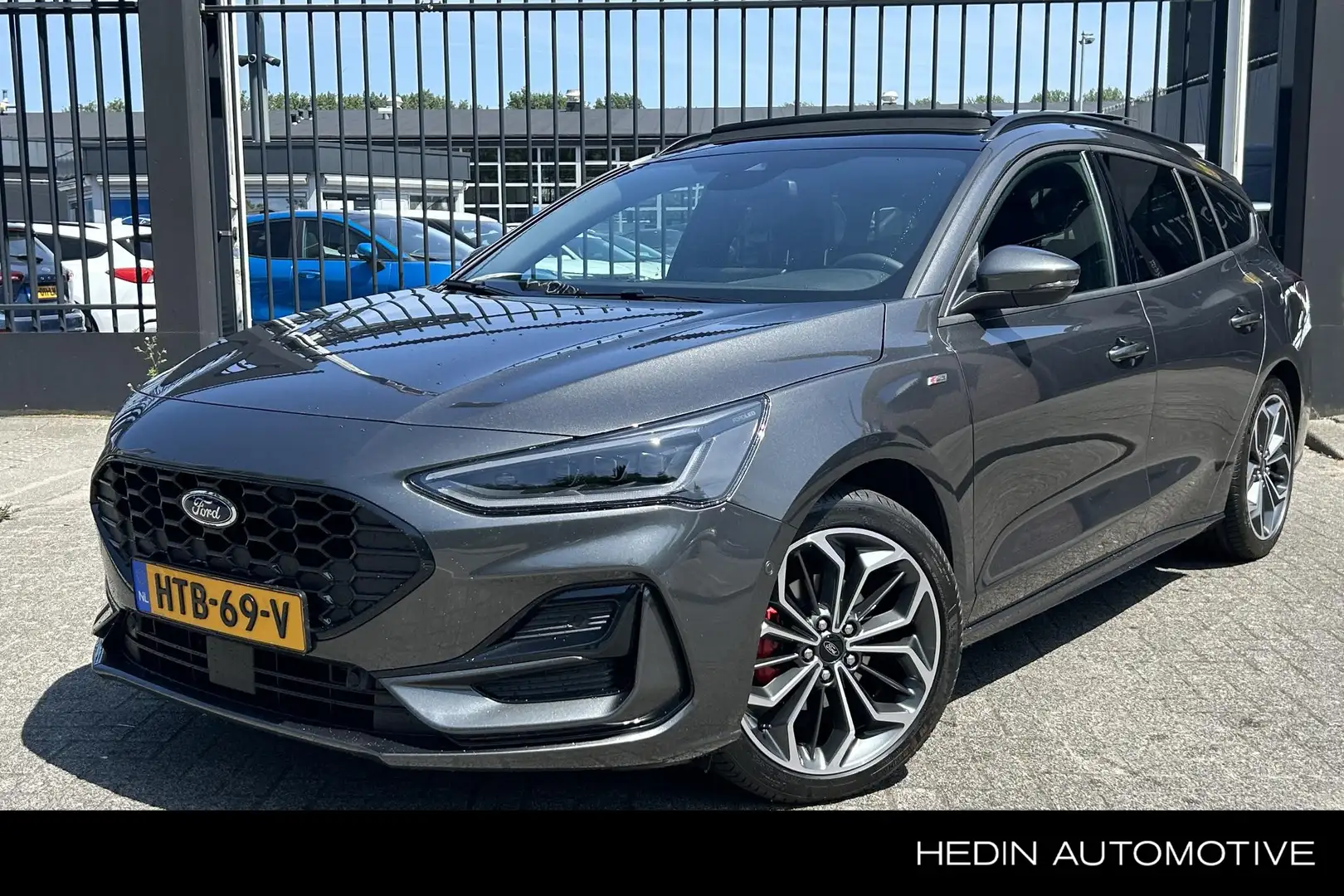 Ford Focus Wagon 1.0 EcoBoost Hybrid ST Line X | Panoramadak Grijs - 1