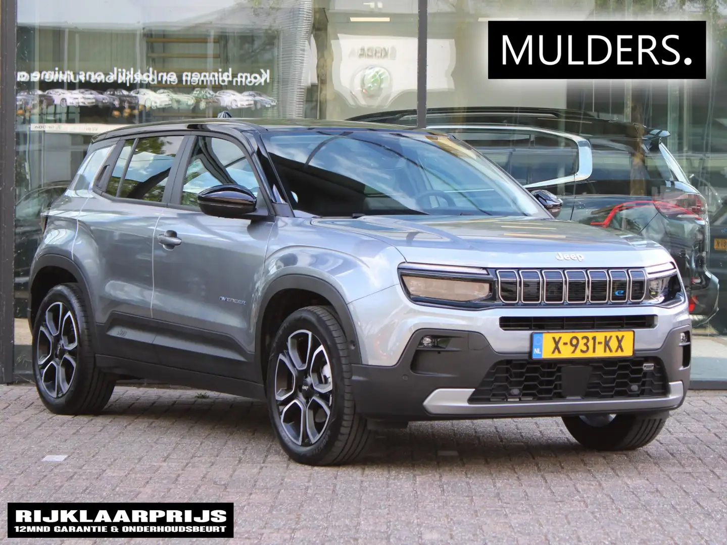 Jeep Avenger 1st Edition 54 kWh | Navi / Camera / Climate Grijs - 1
