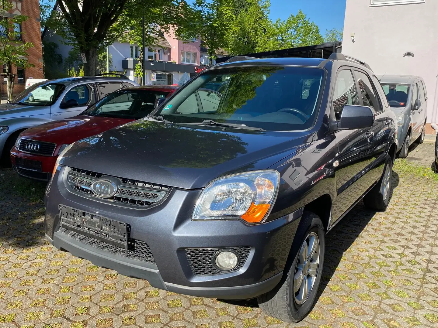 Kia Sportage 2.0 Attract 8-fach bereift, Leder Gris - 2