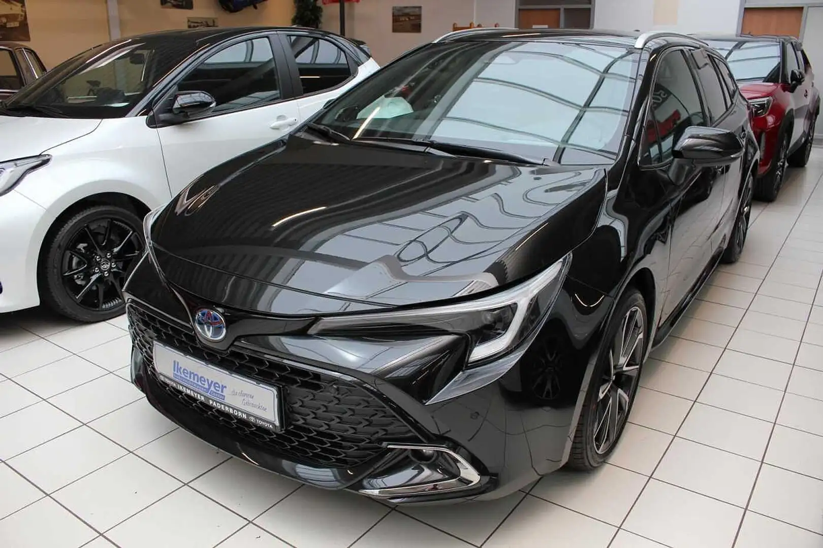 Toyota Corolla Touring Sports 2,0 Hybrid Lounge Panoramadach HUD Negro - 1