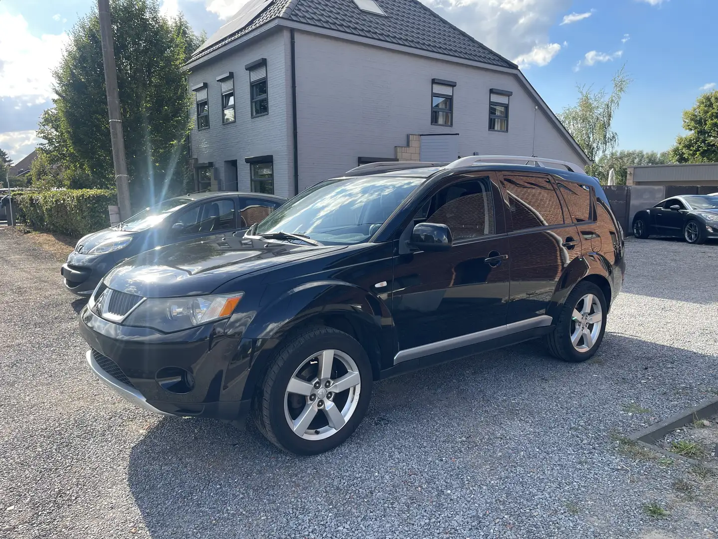 Mitsubishi Outlander 2.0 DI-D 4WD,7 PLaats,Airco,Leder,Sensoren,Cruise, Zwart - 1