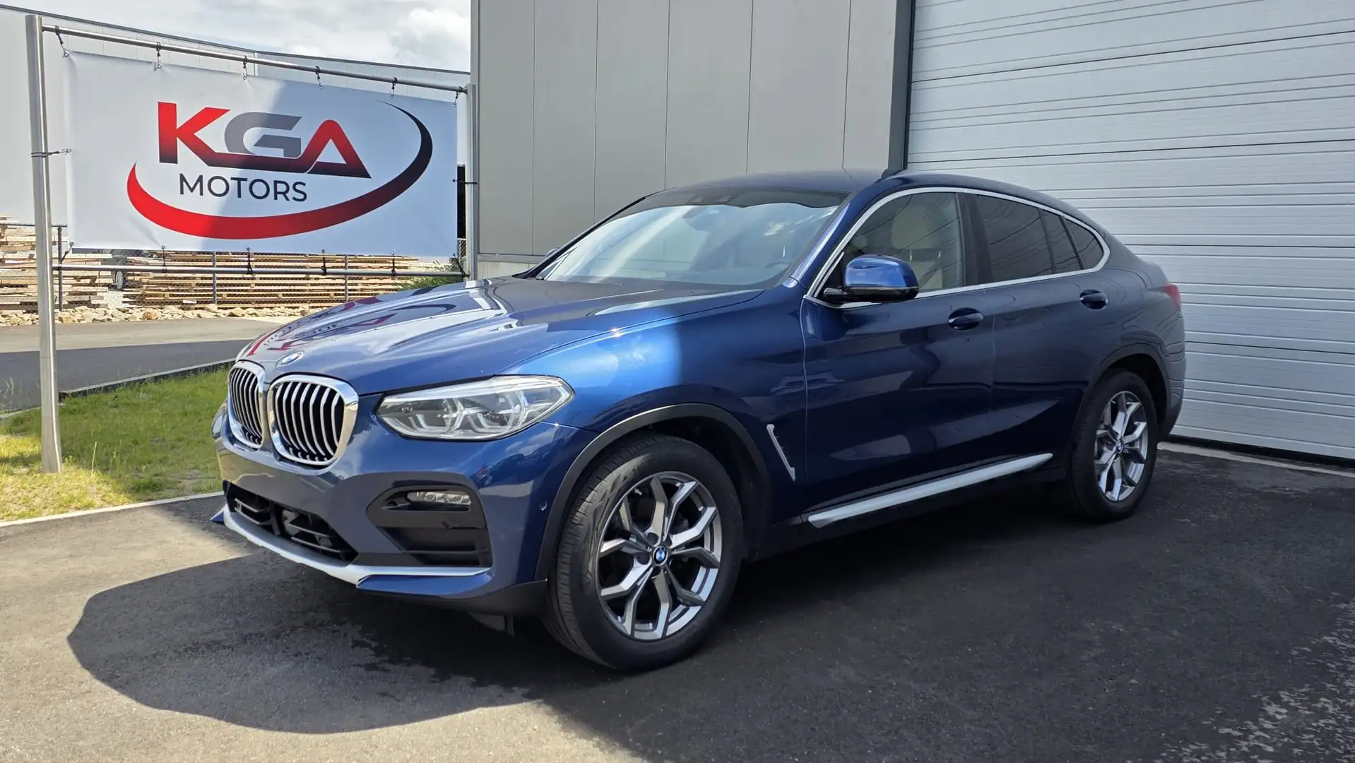 BMW X4 2.0 dA xDrive20 MHEV AdBlue Blauw - 1