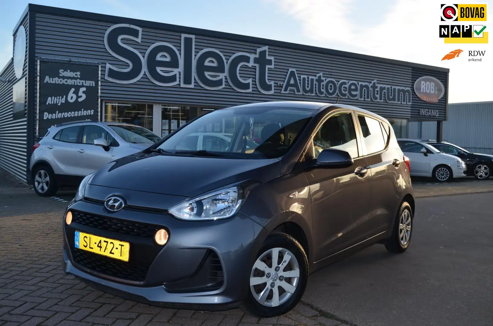 Hyundai i10 1.0i Comfort| 1e eig|Navi|NAP|5DRS|Carplay|cruise Grau - 1