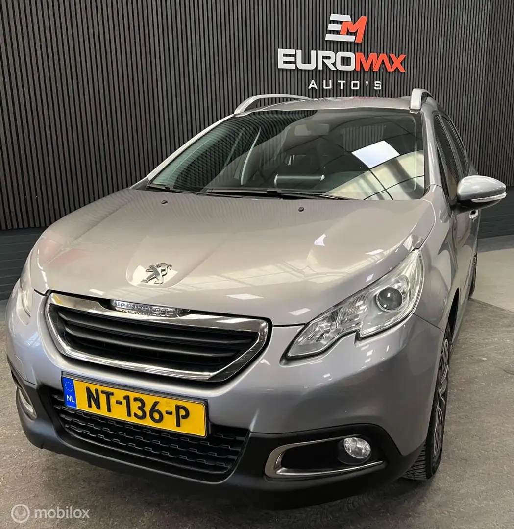 Peugeot 2008 1.2 PureTech Style NAP - 1e Eigenaar - Carplay Gris - 1