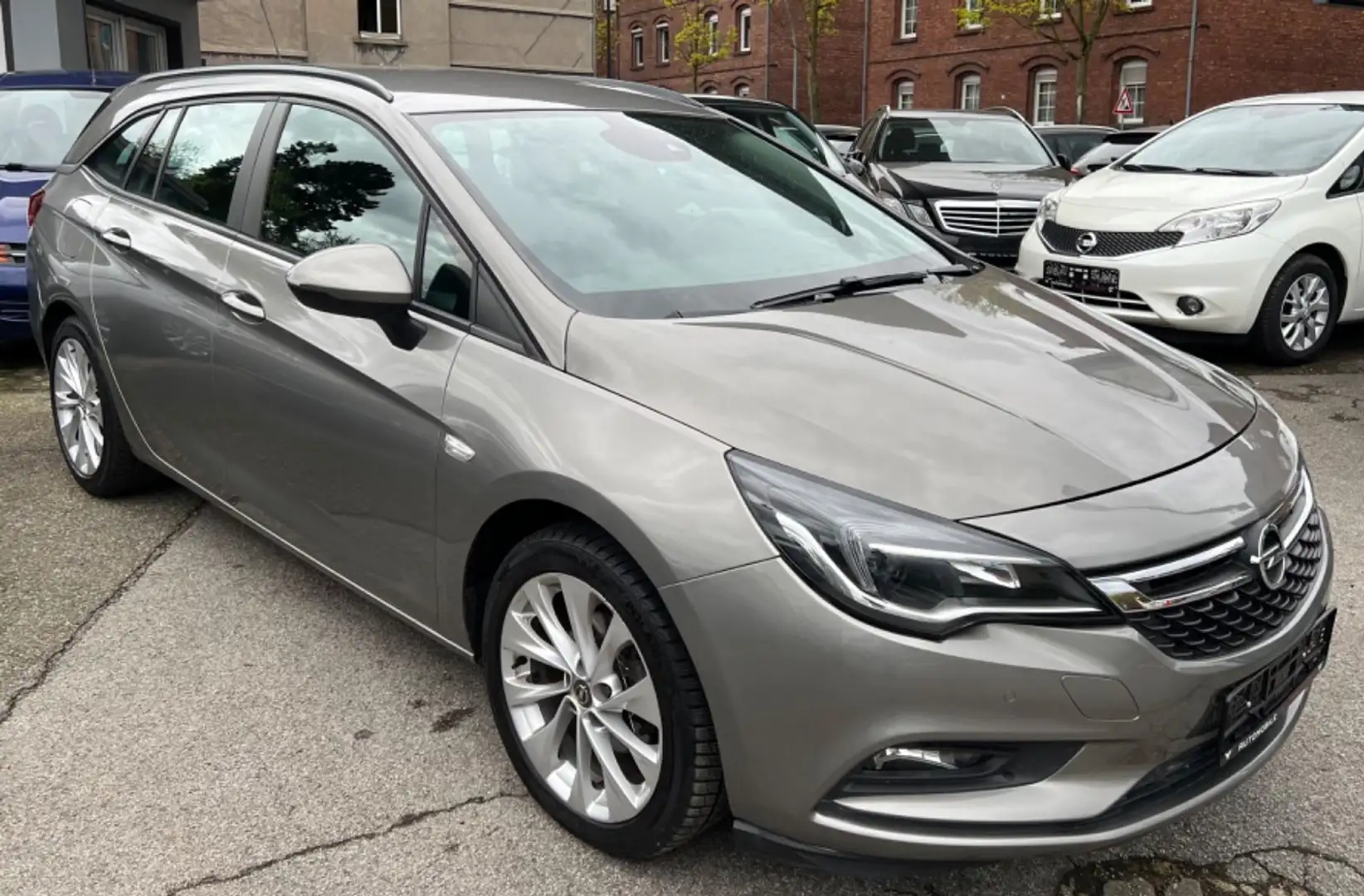 Opel Astra K ST 1.0i KLIMA*SHZ*LHZ*SHA*TEMPOMAT Beige - 1
