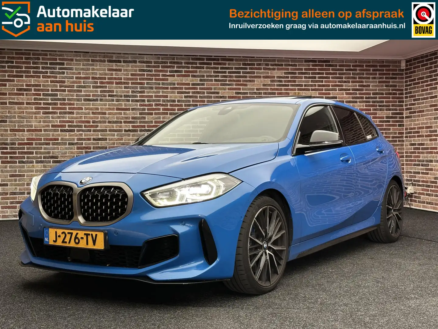 BMW 135 1-serie M135i xDrive M-pakket | Dak| CarPlay| H/K| Blauw - 1