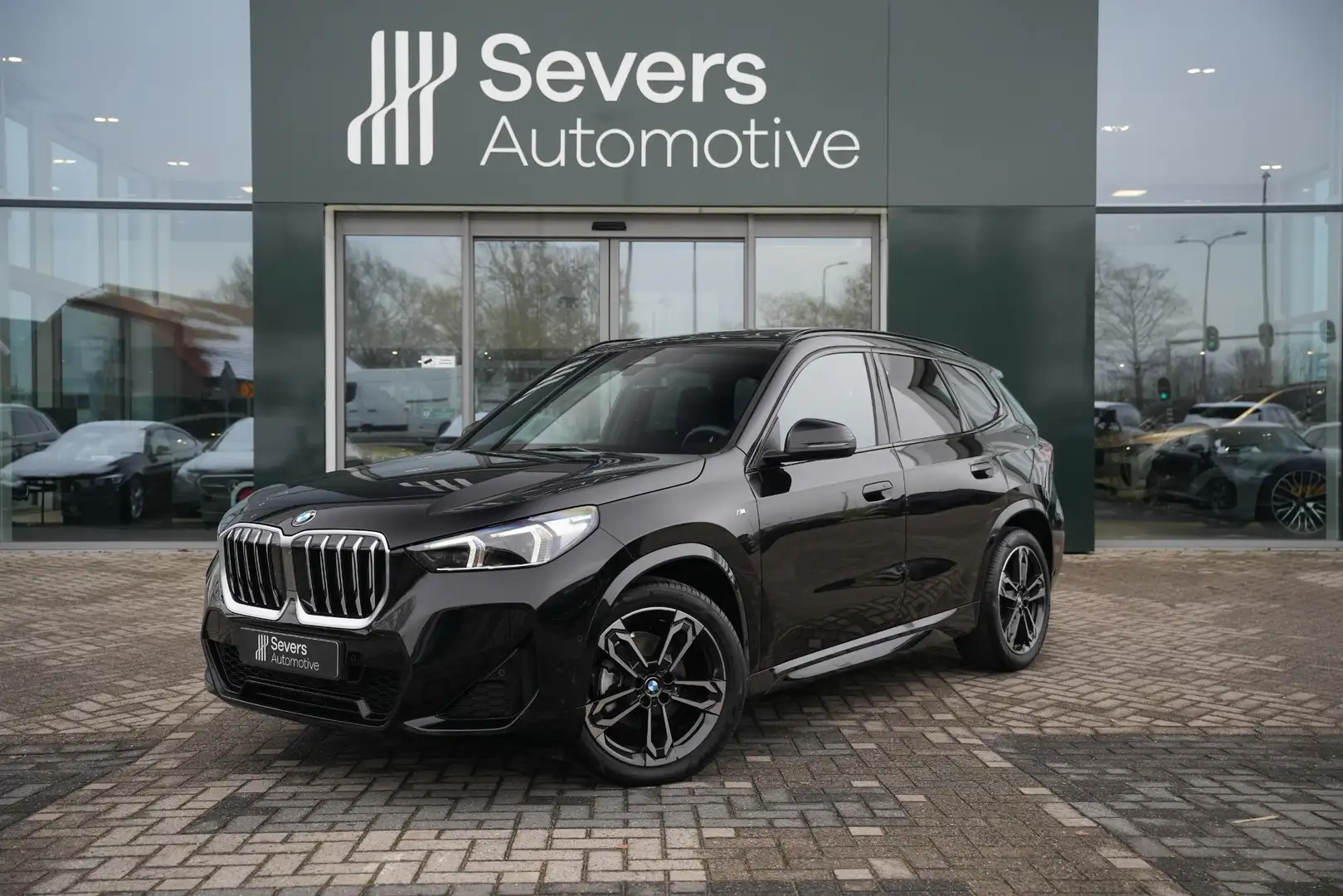 BMW X1 sDrive18i M Sportpakket | Panoramadak | Driving As Noir - 1