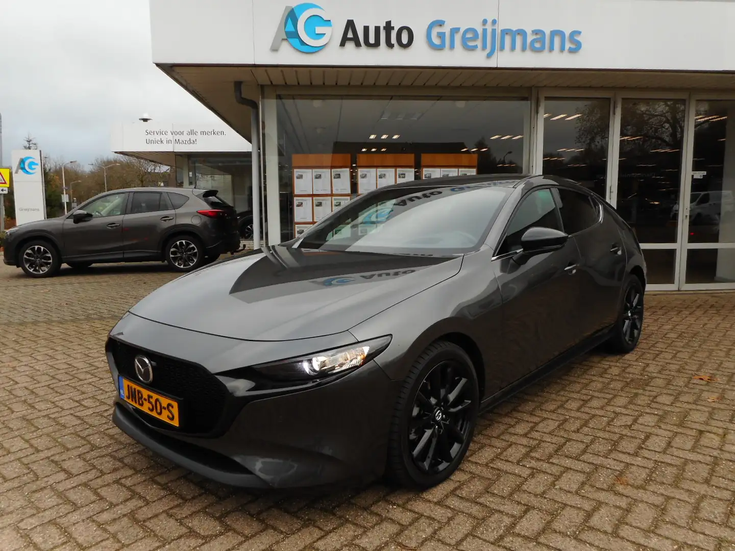 Mazda 3 2.0 e-SkyActiv-G M Hybrid 150 Nagisa Grijs - 1