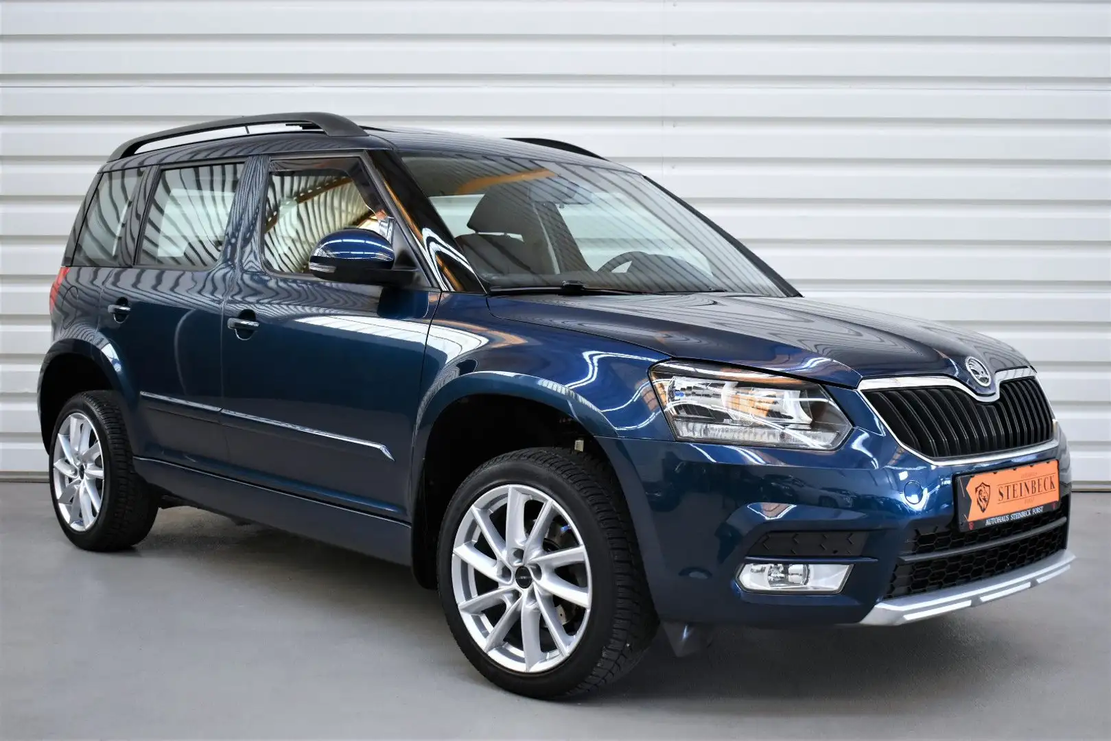 Skoda Yeti Active+Panorama+SHZ+AHK+2.Hand+52.200KM Синій - 1
