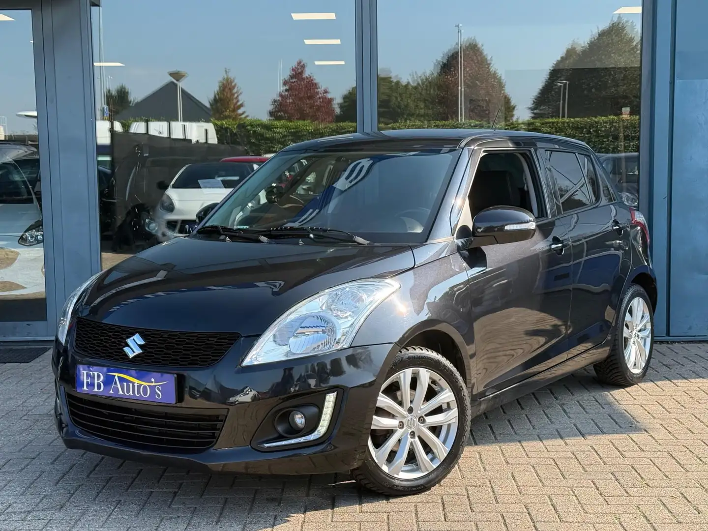 Suzuki Swift 1.2 Colorline EASSS Airco Lmv Zwart - 1