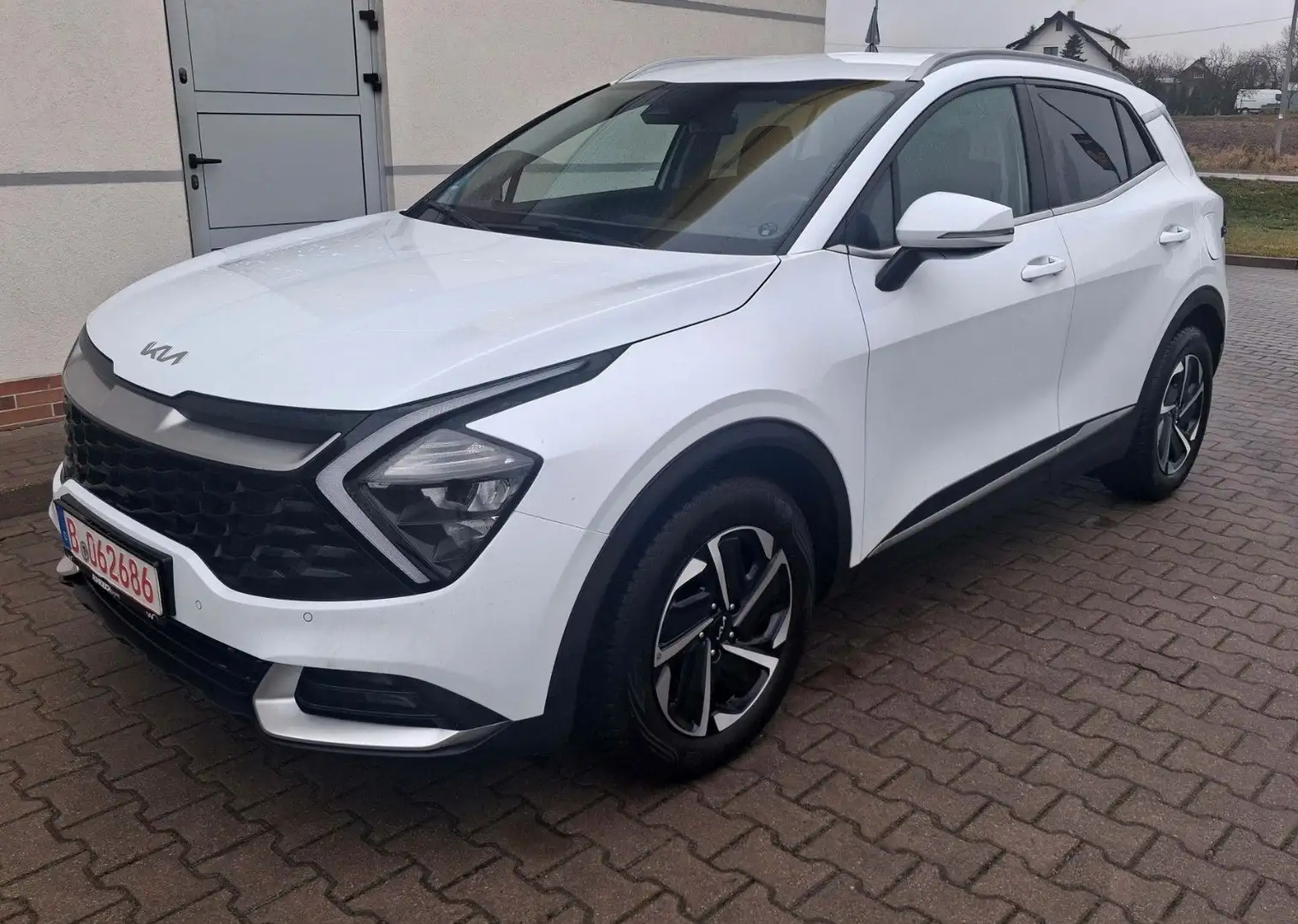 Kia Sportage Vision 1.6 T-GDI mHEV 7-DCT Weiß - 1