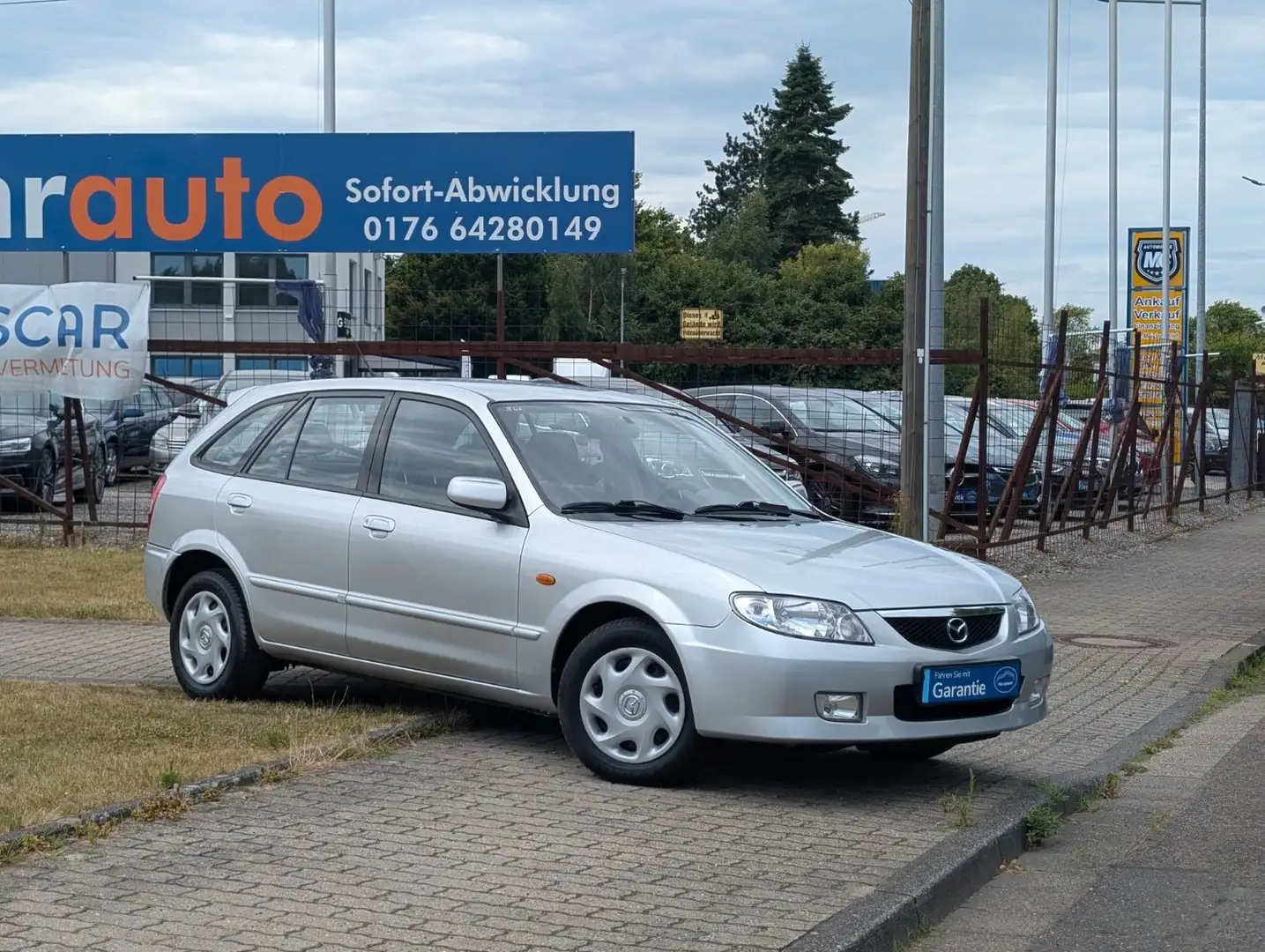 Mazda 323 F 1.6 Exclusive Autom. Touring-Paket*1-HAND Серебристый - 2
