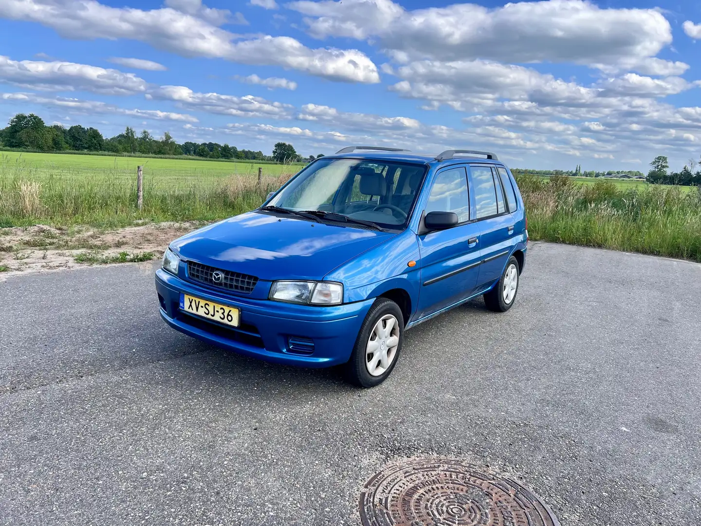 Mazda Demio Demio 1.3 GLX Blauw - 1