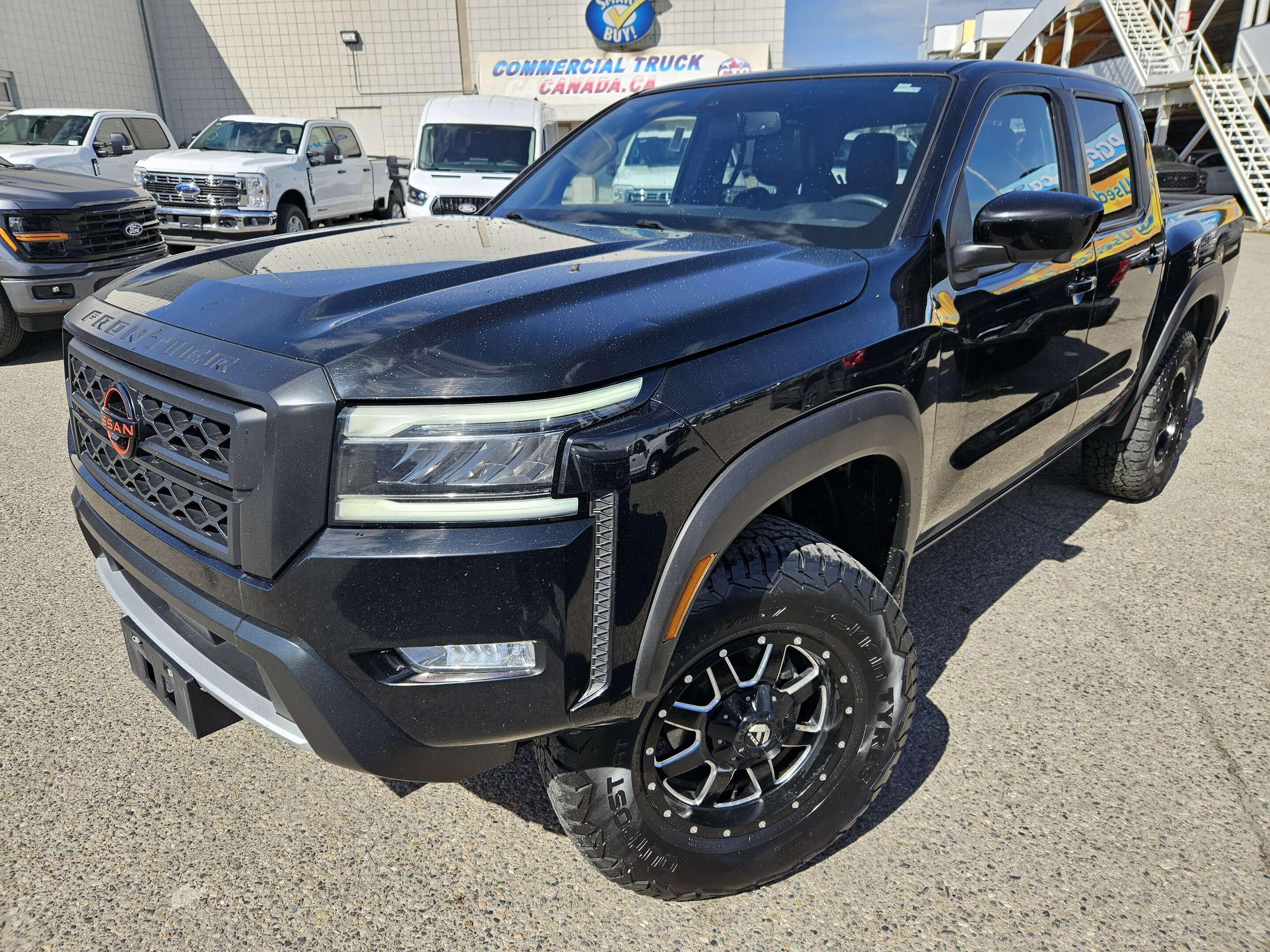 Black 2022 Nissan Frontier Pickup Truck Four-Wheel Drive Automatic