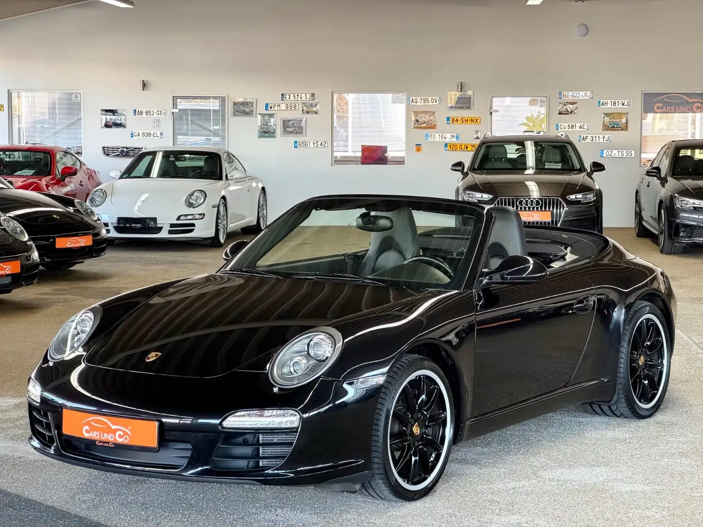 Porsche 997 .2/911 Carrera Cabrio PDK DFz*SHZ*NAV*PDC*TEM Schwarz - 1