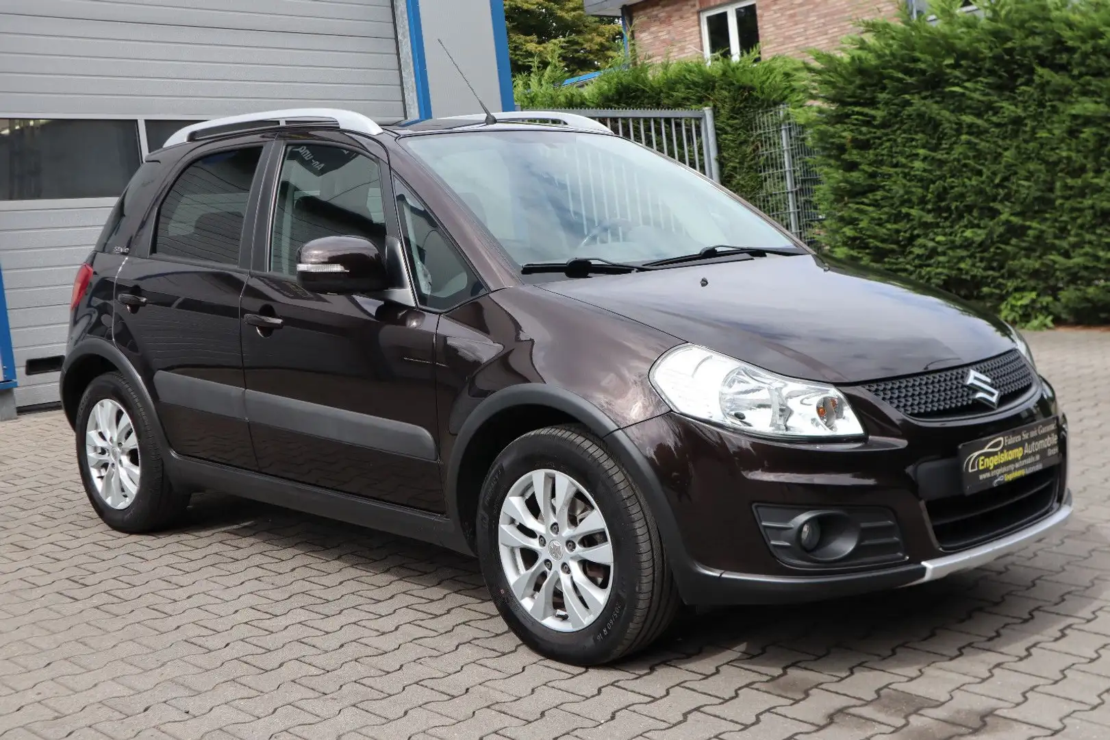 Suzuki SX4 Style/NAVI/MFL/KEYLESS/SCHECKH/1.HD Braun - 1