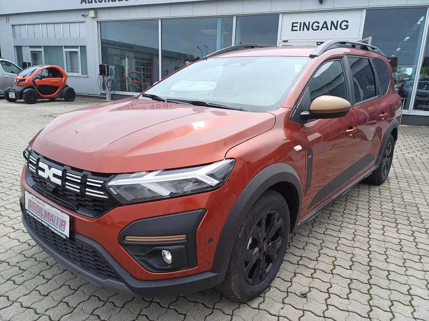 Dacia Jogger 1.6 HYBRID 140 Extreme+ 7-Sitzer/NAVI/SITZHEIZUNG/ Braun - 1