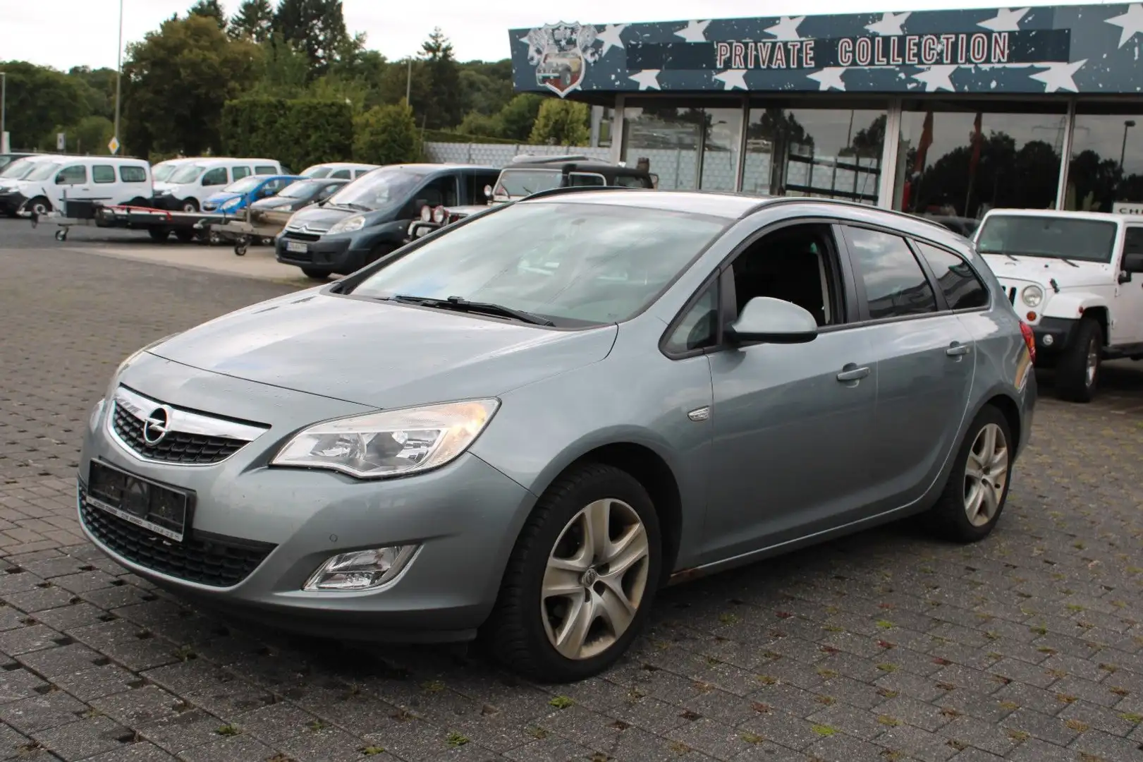 Opel Astra J 1.4 Turbo Sports Tourer Edition/AHK/PDC Silber - 1