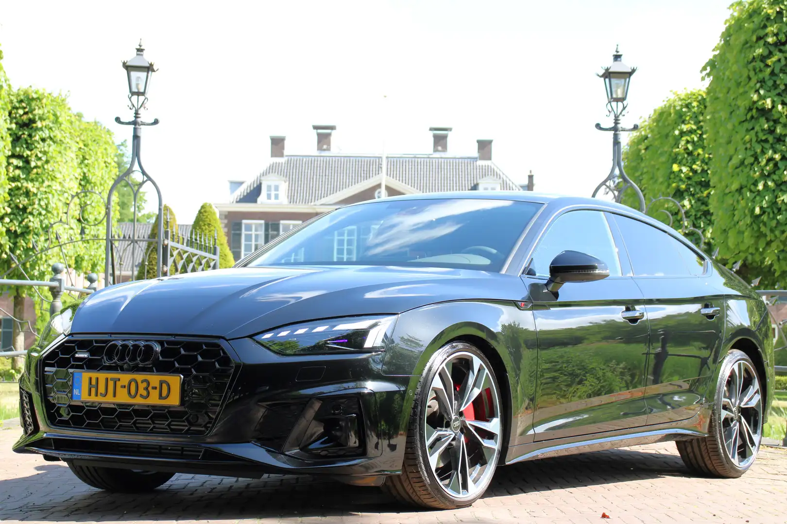 Audi A5 Sportback 45 TFSI quattro S edition UNIEK! | TREKH Zwart - 1