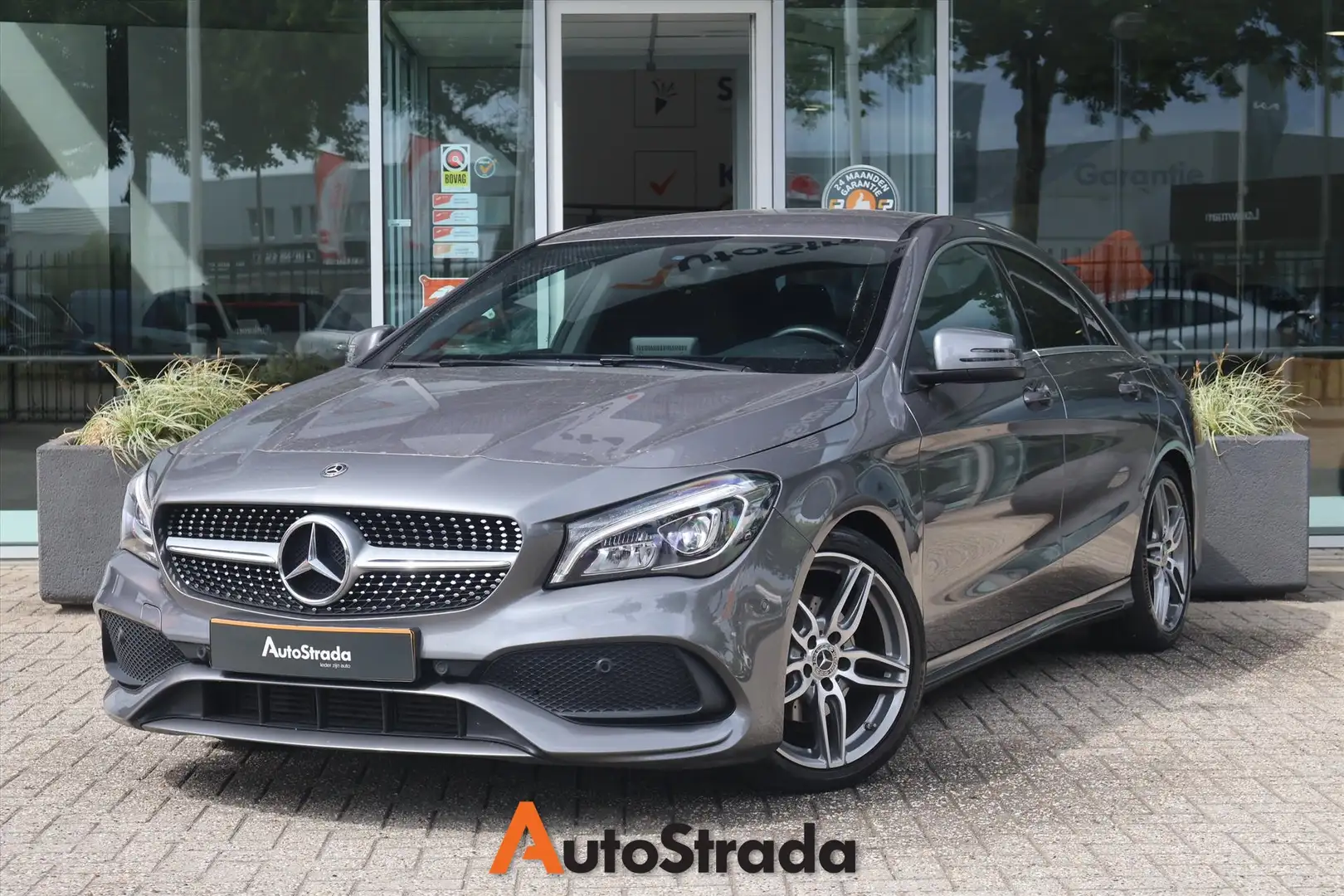 Mercedes-Benz CLA 180 AMG-Line 122pk | Camera | Cruise | Navigatie | LED Grijs - 1