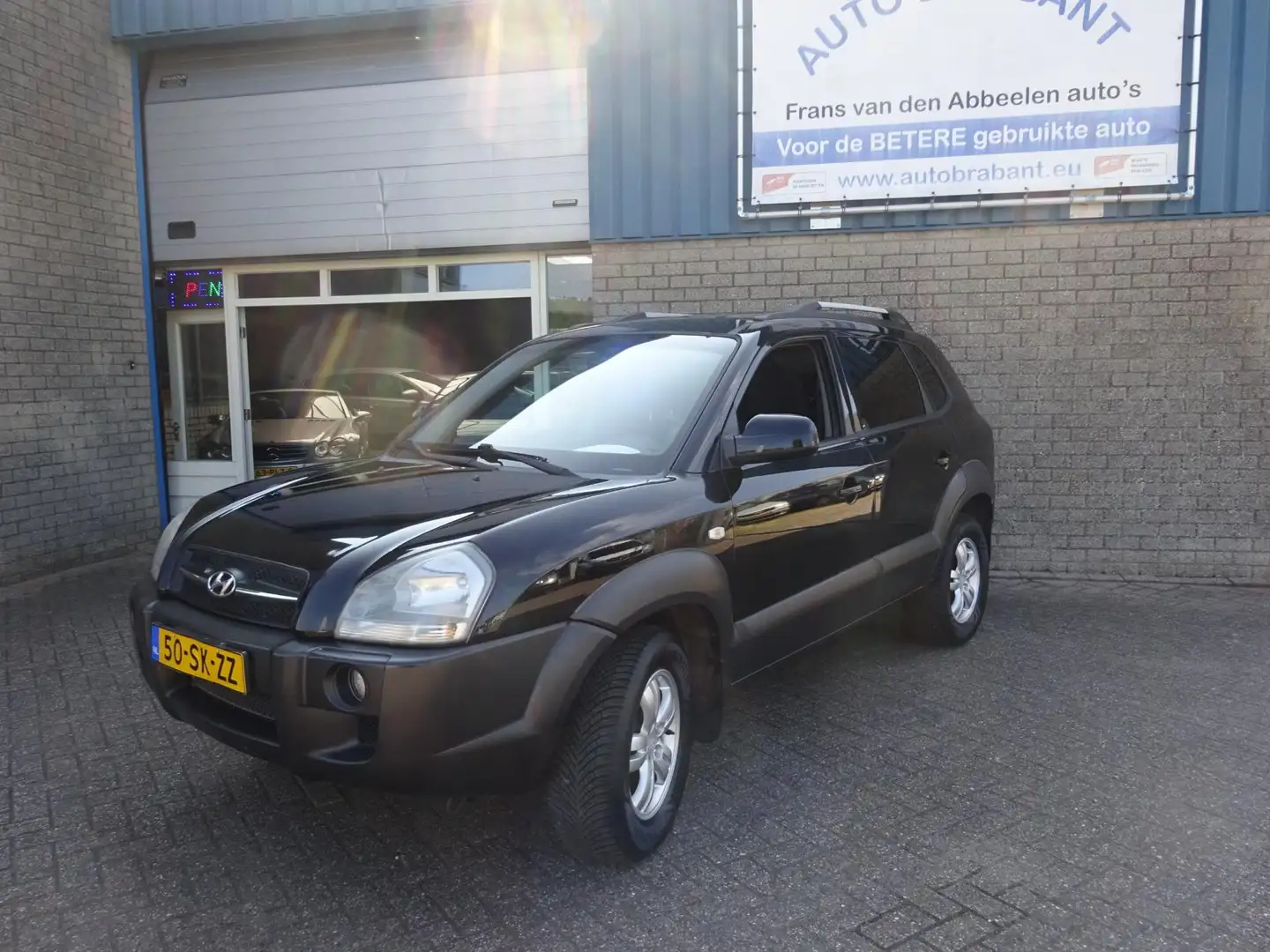 Hyundai TUCSON 2.0i Dynamic Zwart - 1