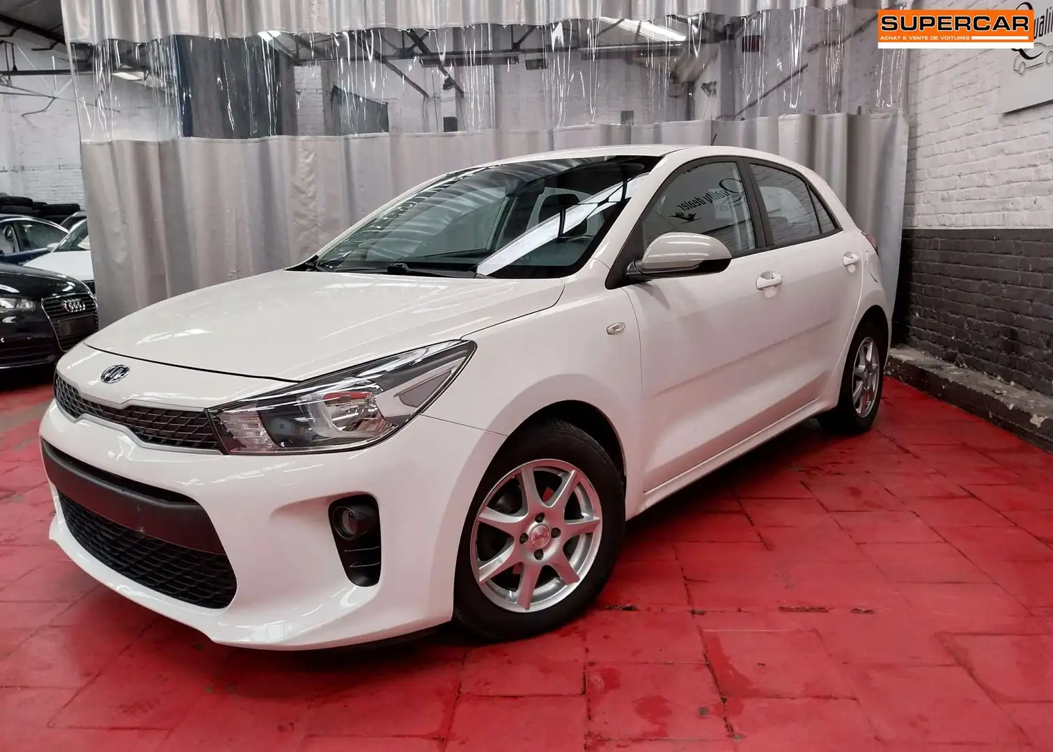 Kia Rio 1.2i*Sièges chauff*Capteurs AR*224 € x 48m* Blanc - 1