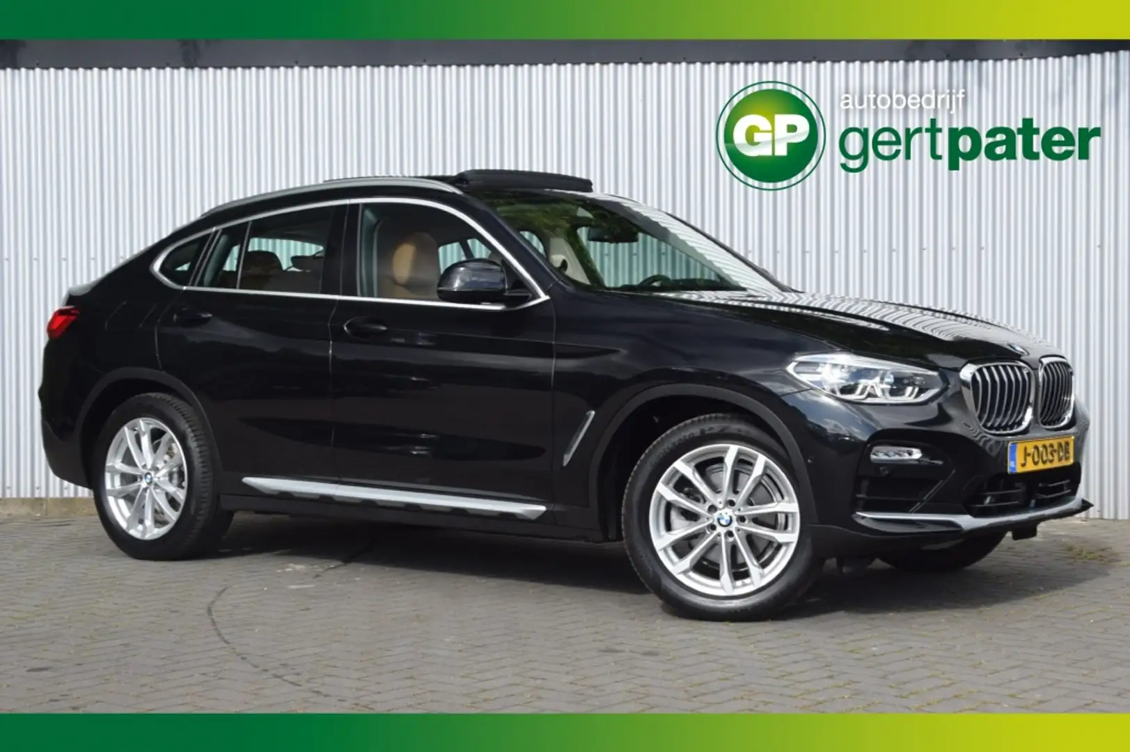 BMW X4 xDrive20i High Executive Pano/Leer/HeadUp/Trekhaak Zwart - 1