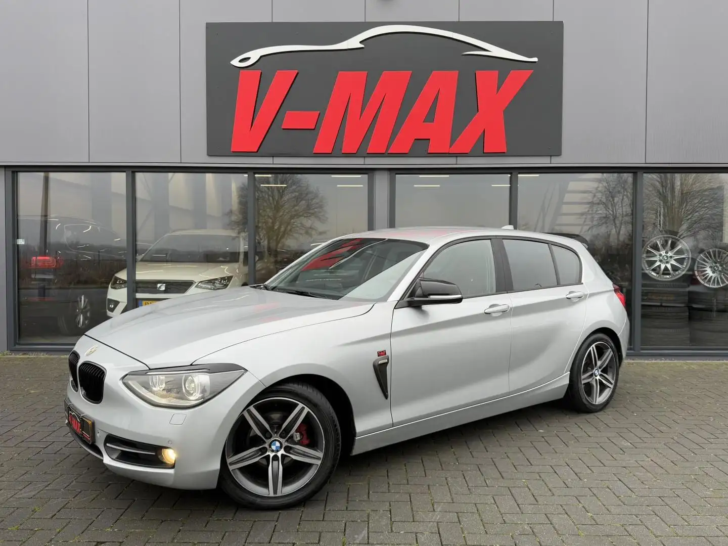 BMW 116 1-serie 116i Executive Sport Xenon Naviprof Clima Grijs - 1