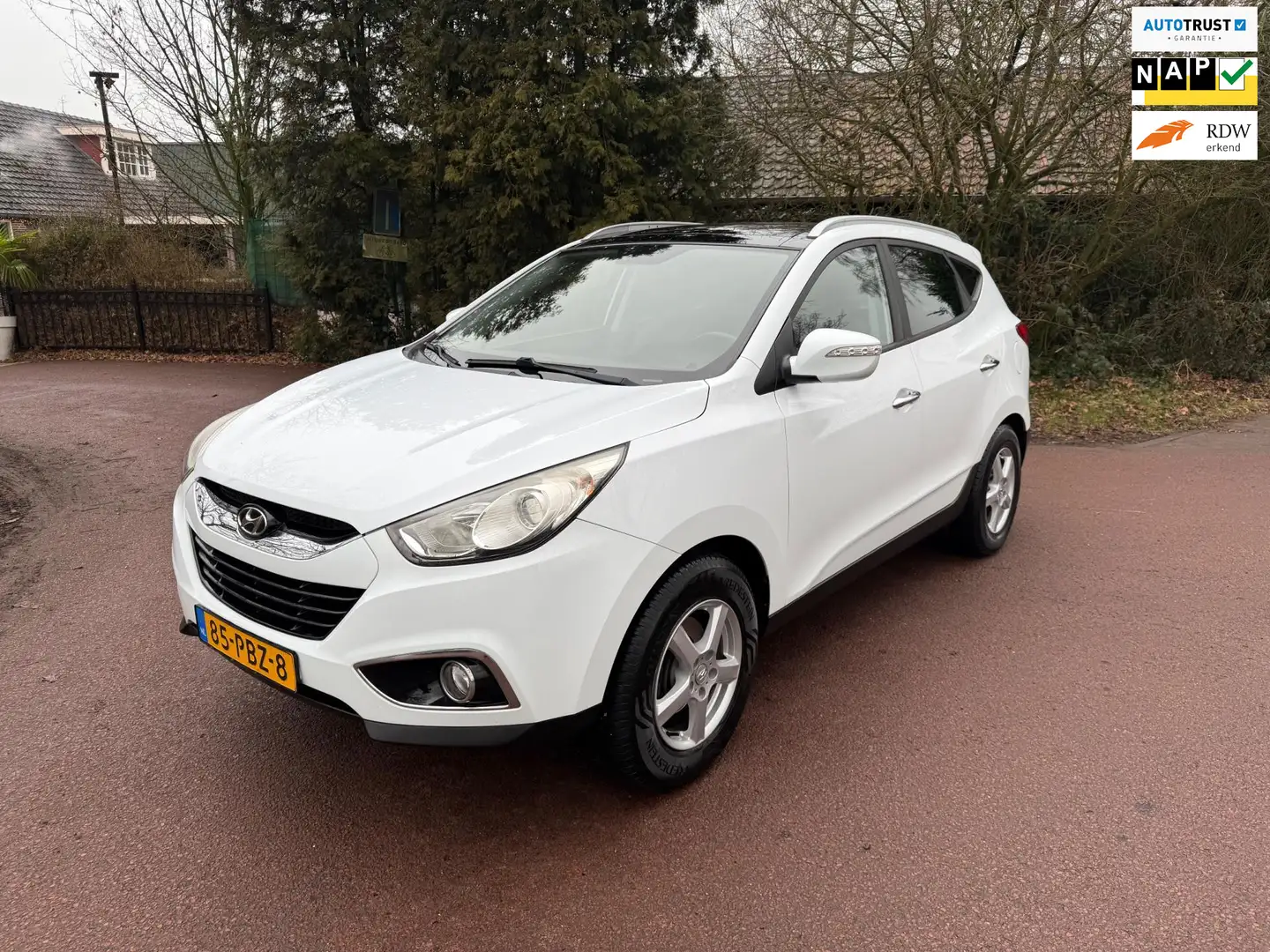 Hyundai iX35 2.0i Style / Airco / Pano / NAP / Aux / Trekhaak / Weiß - 1