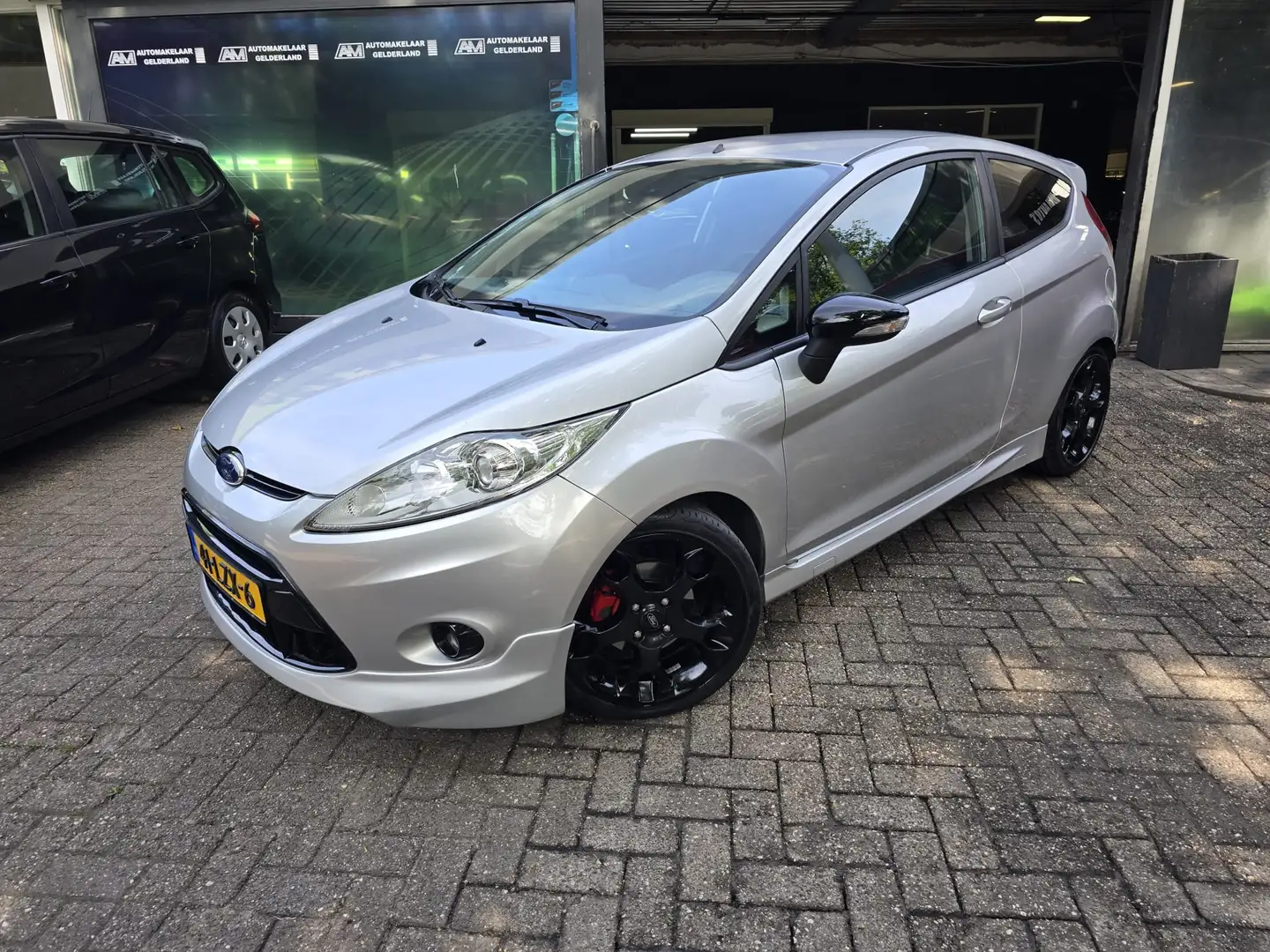 Ford Fiesta 1.25 Titanium | 12 MND GARANTIE | CRUISE | AIRCO | Grigio - 1
