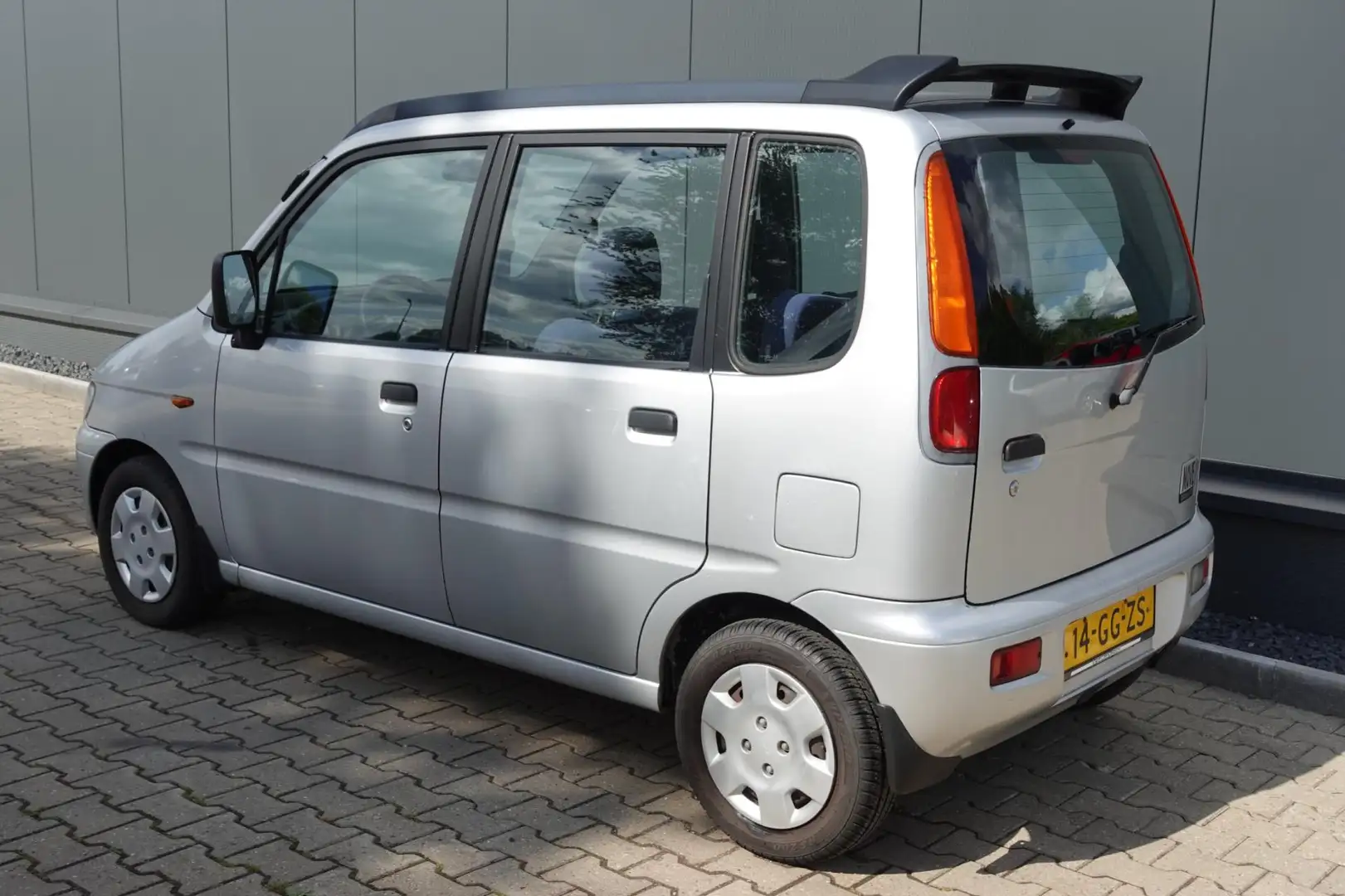 Daihatsu Move 1.0-12V Gris - 2